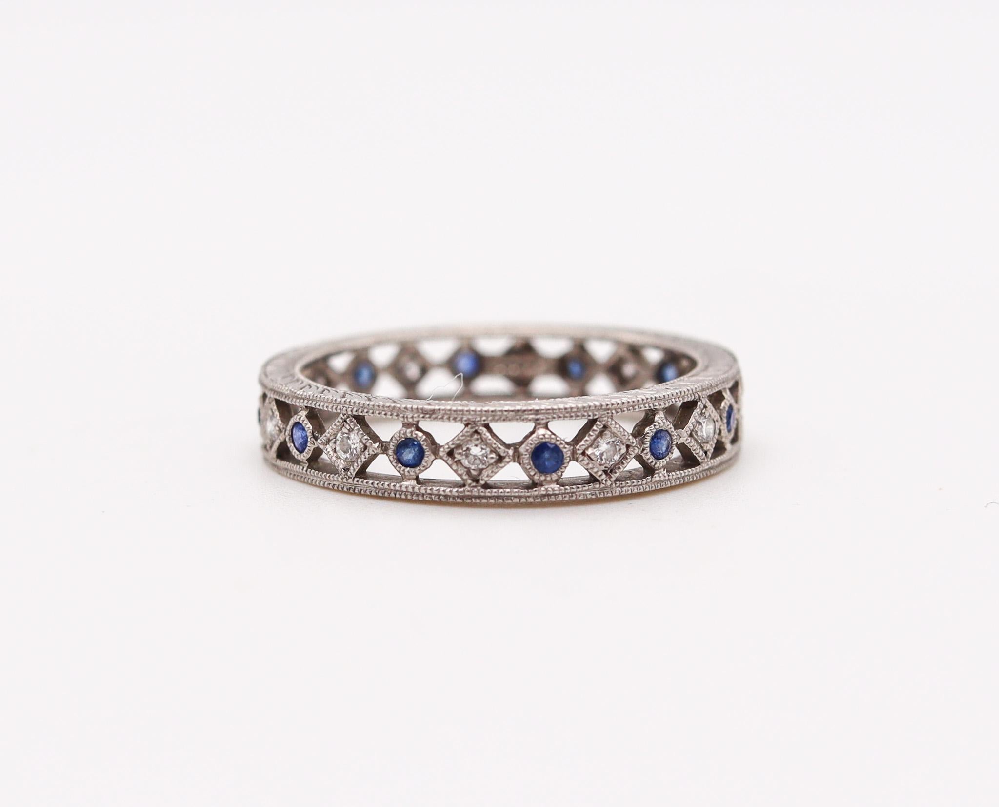Women's Neo Classic Eternity Ring in Platinum with Diamonds and Blue Sapphires For Sale