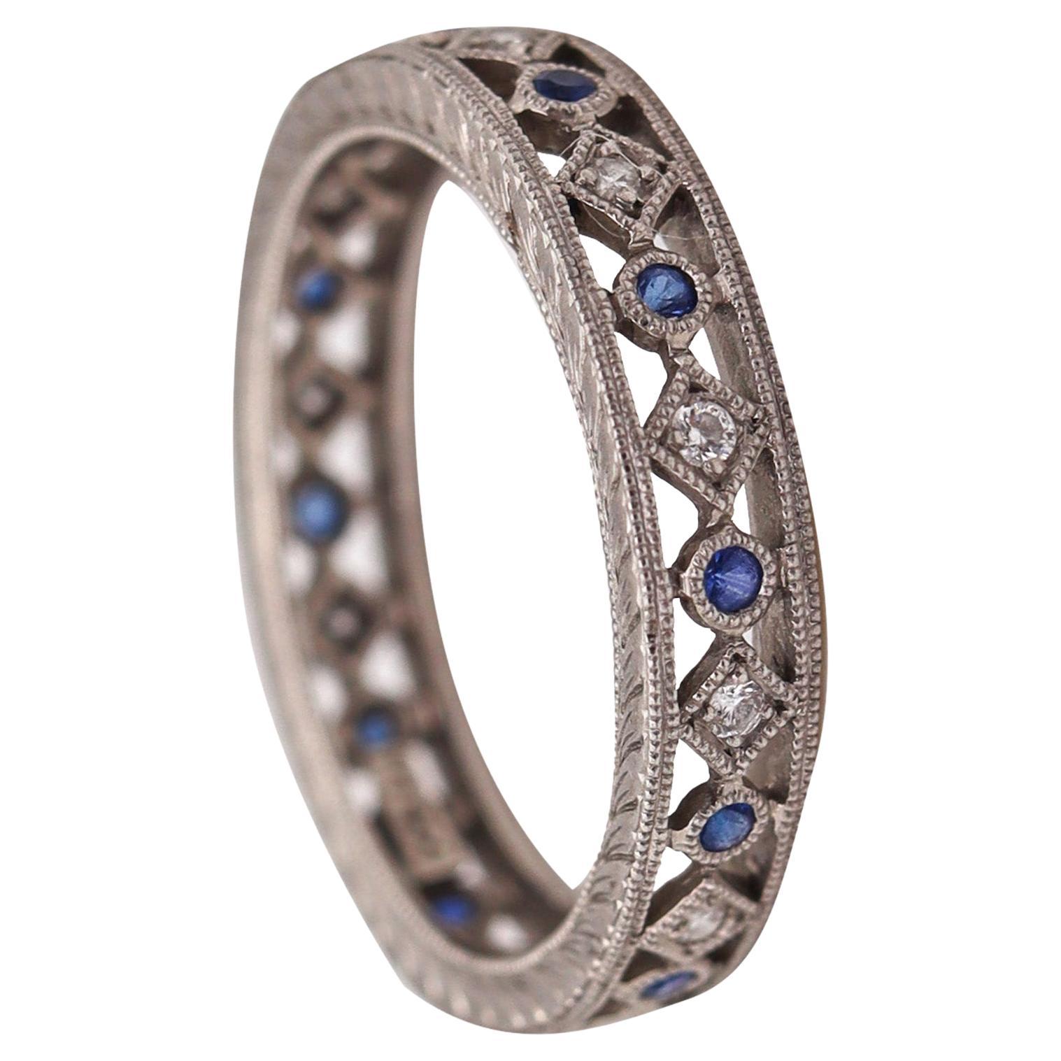 Neo Classic Eternity Ring in Platinum with Diamonds and Blue Sapphires For Sale