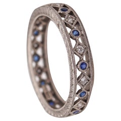 Neo Classic Eternity Ring in Platinum with Diamonds and Blue Sapphires