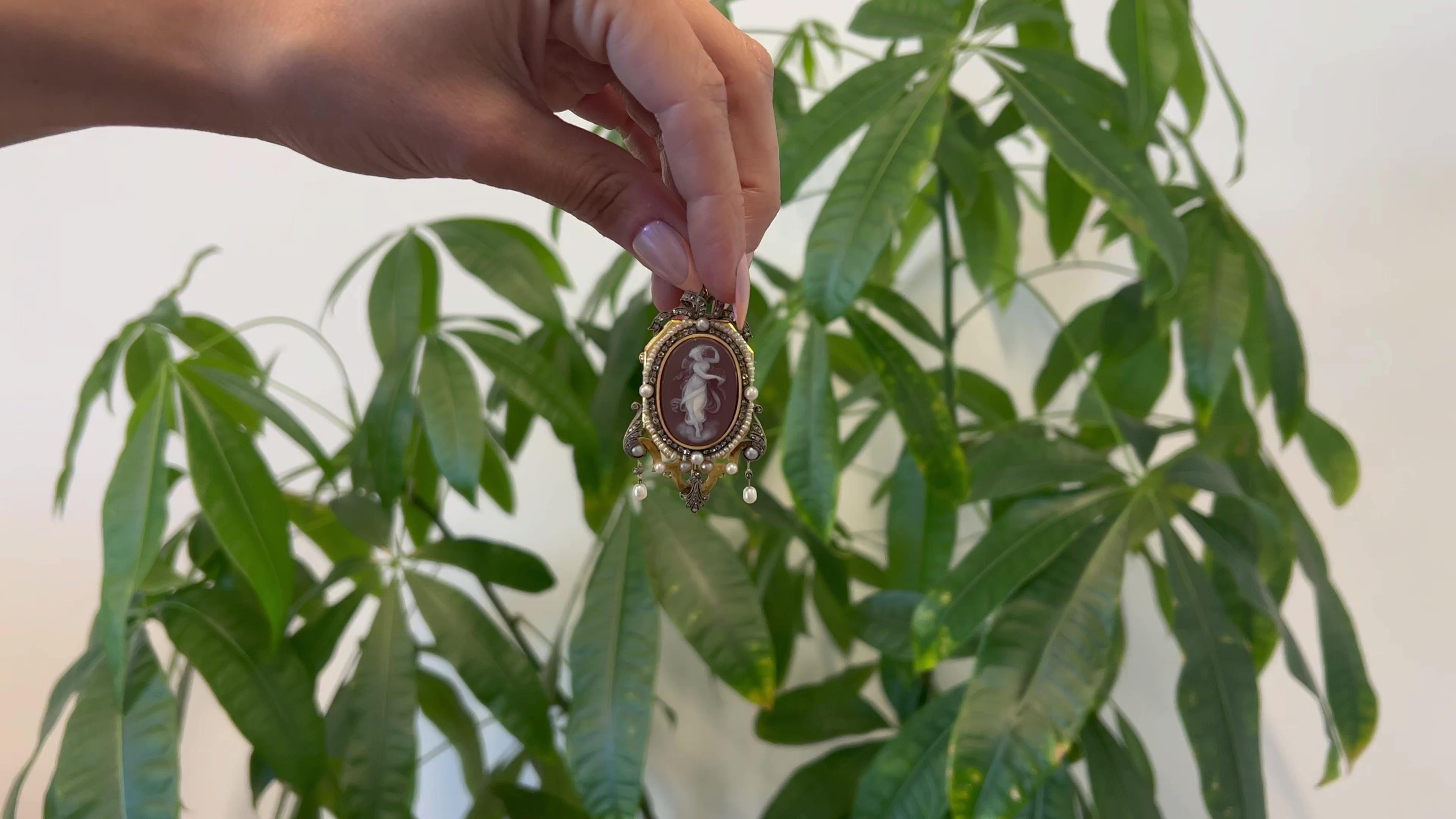 One Neo Classic French Carved Agate Psyche Cameo 18k Yellow Gold Silver Locket Pendant. Featuring one carved carnelian agate cameo that represents the Greek-Roman mythological scene of Psyche frolicking. Accented by 106 rose and senaille cut