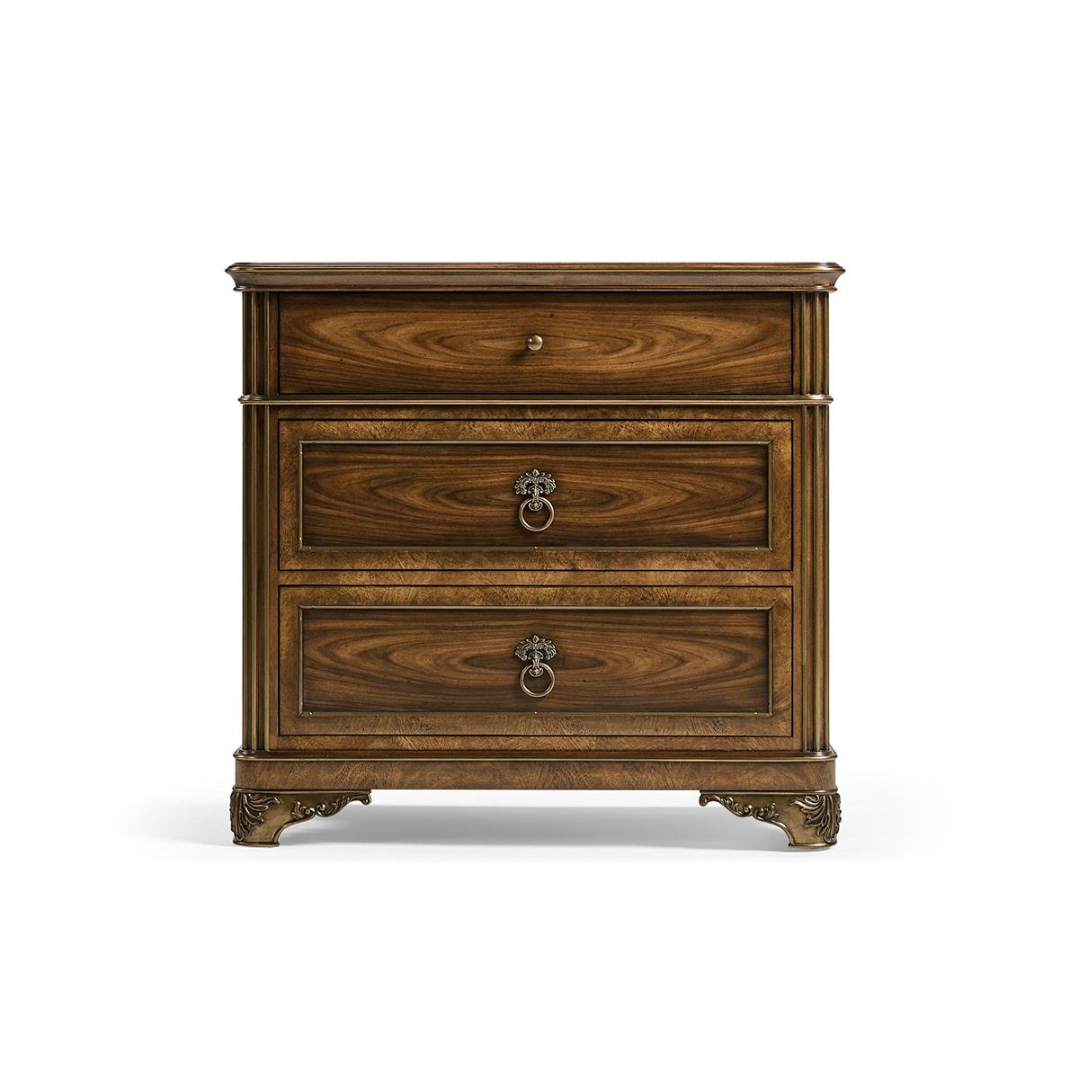 Drawing inspiration from classical aesthetics, this chest exudes sophistication with its classic silhouette and refined proportions.


The nightstand is constructed with mahogany and exotic woods. Elevating its allure, it also features brass inlay