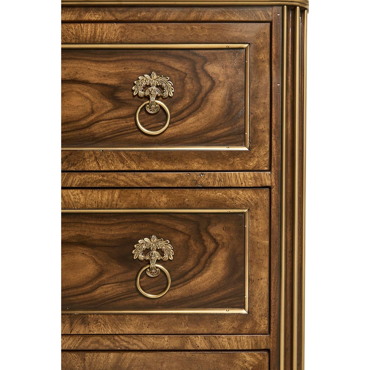 Drawing inspiration from classical aesthetics, this chest exudes sophistication with its classic silhouette and refined proportions.


The chest of drawers is constructed with mahogany and exotic woods. Elevating its allure, it also features brass