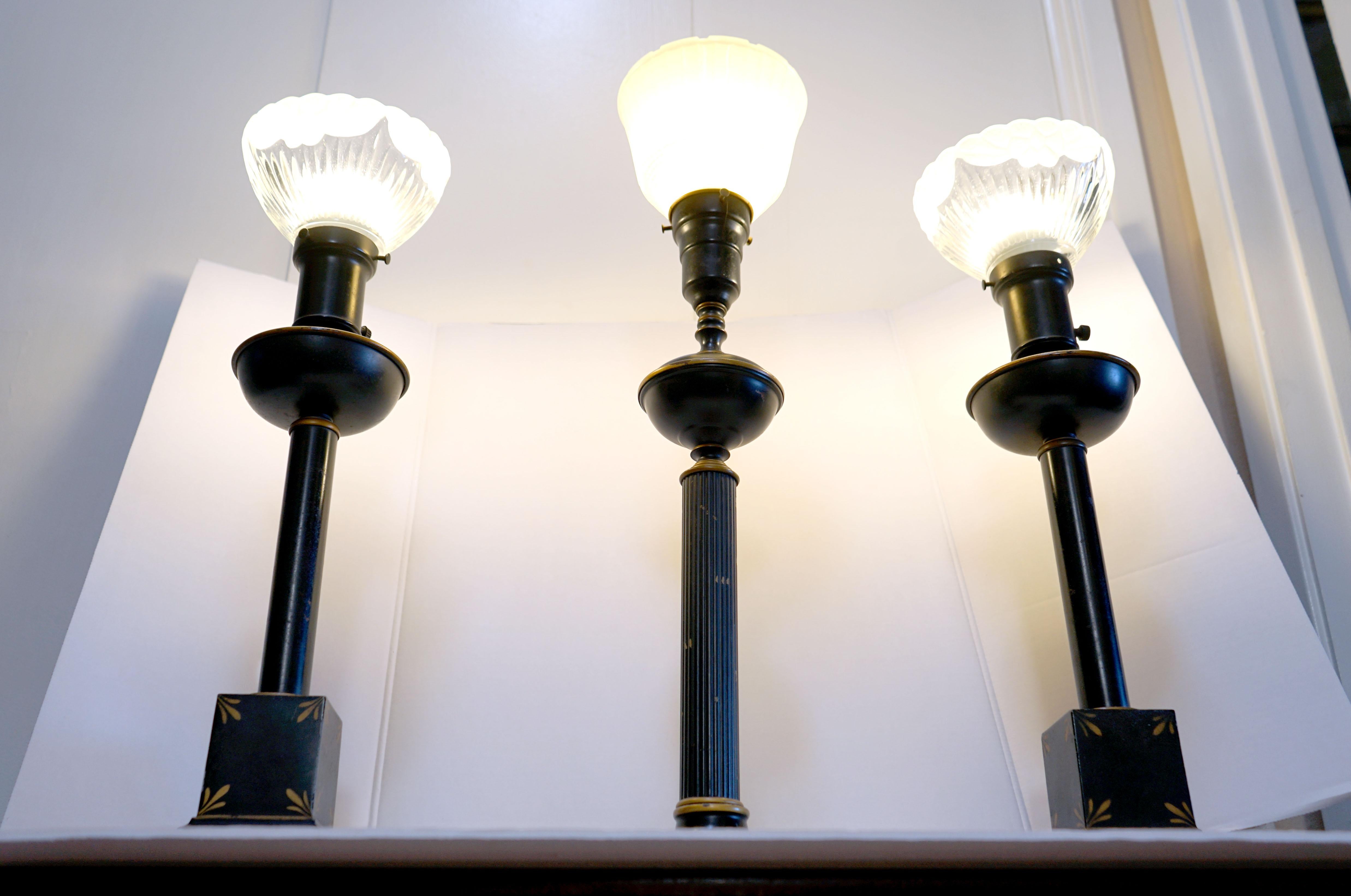20th Century Neo classical Assembled Trio of Ebonized Table Lamps with Glass Shades For Sale
