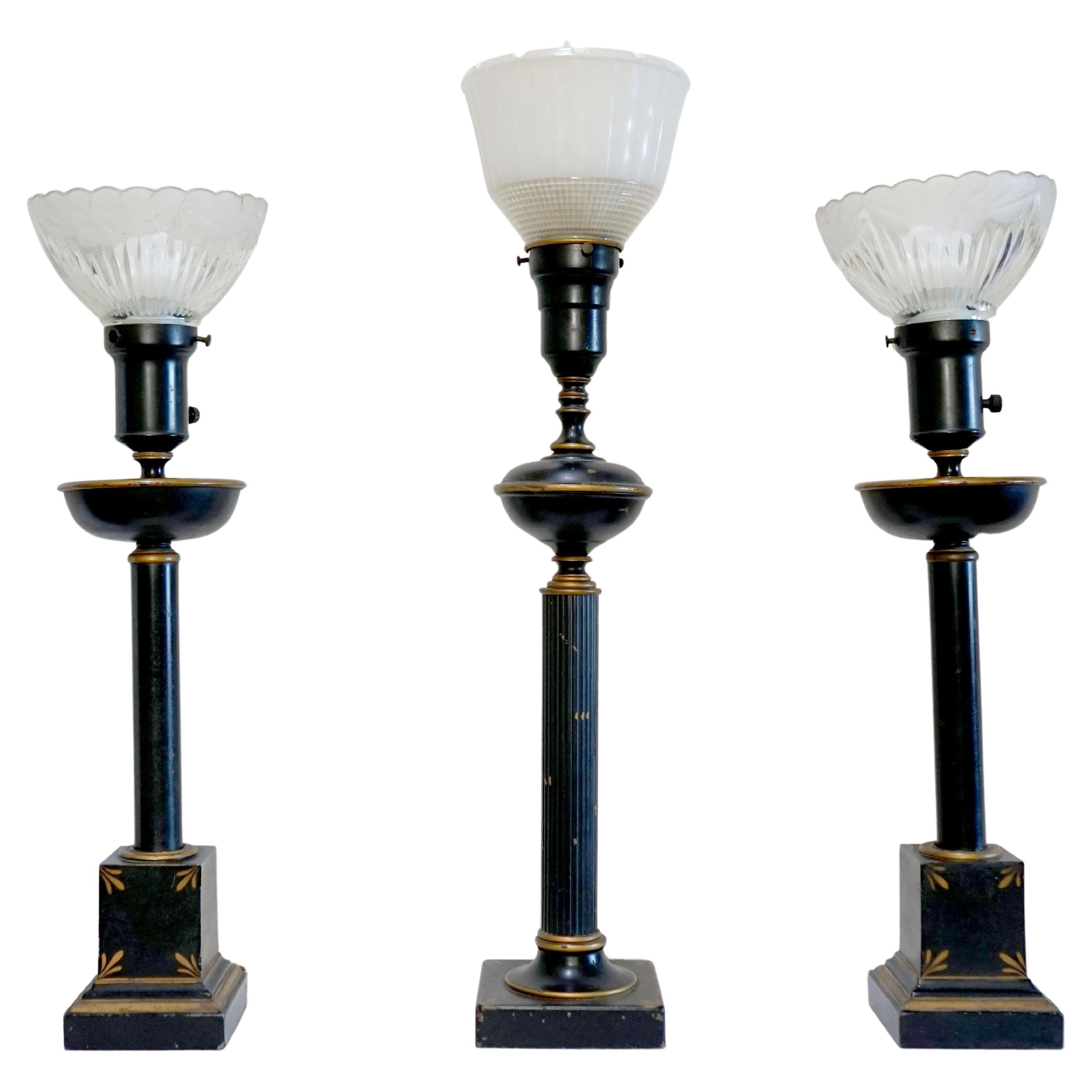 Neo classical Assembled Trio of Ebonized Table Lamps with Glass Shades For Sale