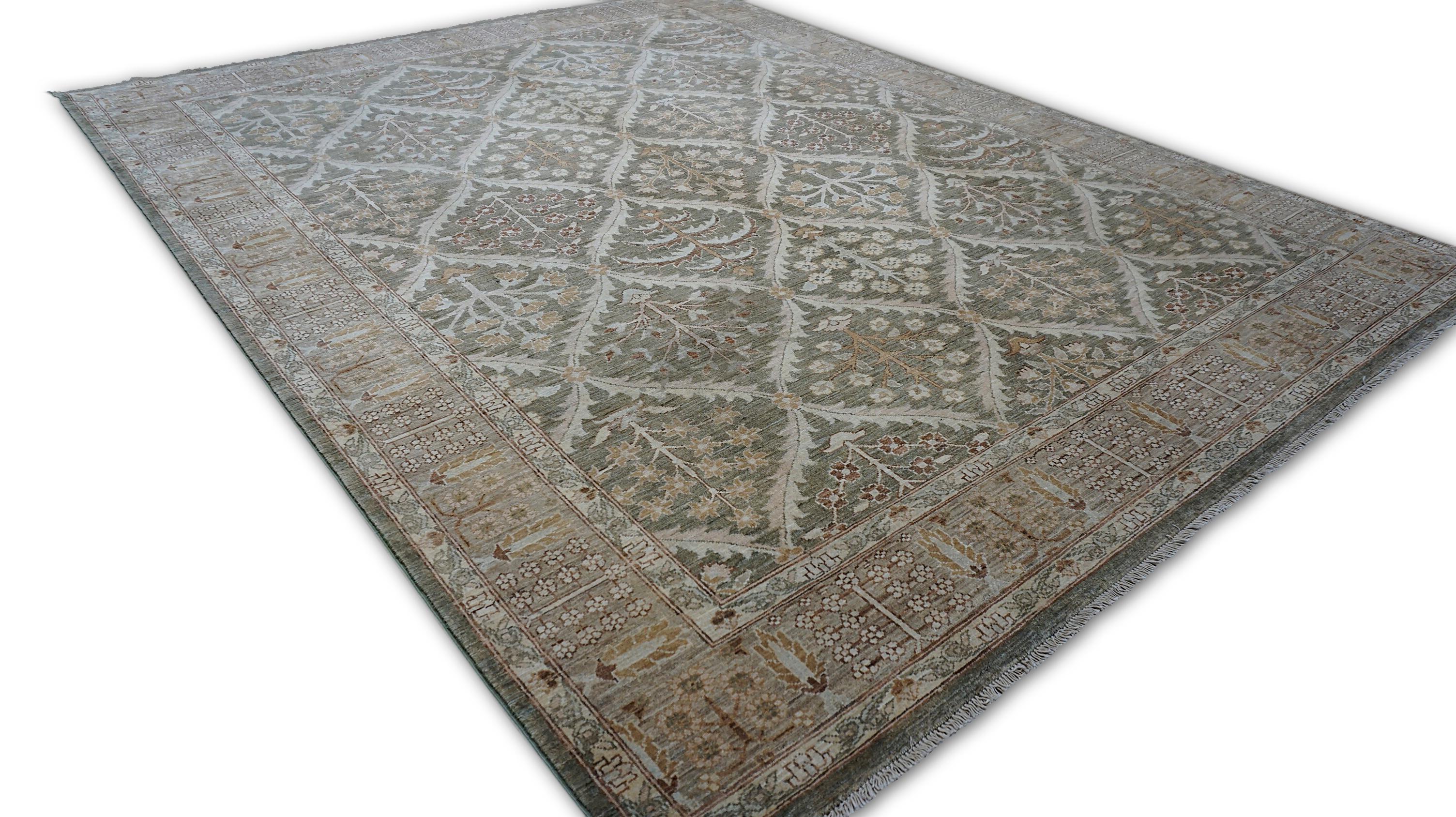 This rug is a hand-knotted Tree-of-Life design rug, expertly woven with hand-spun wool using traditional techniques. Featuring an elegant lattice structure enclosing stylized tree motifs and floral sprigs, the rug draws inspiration from classical