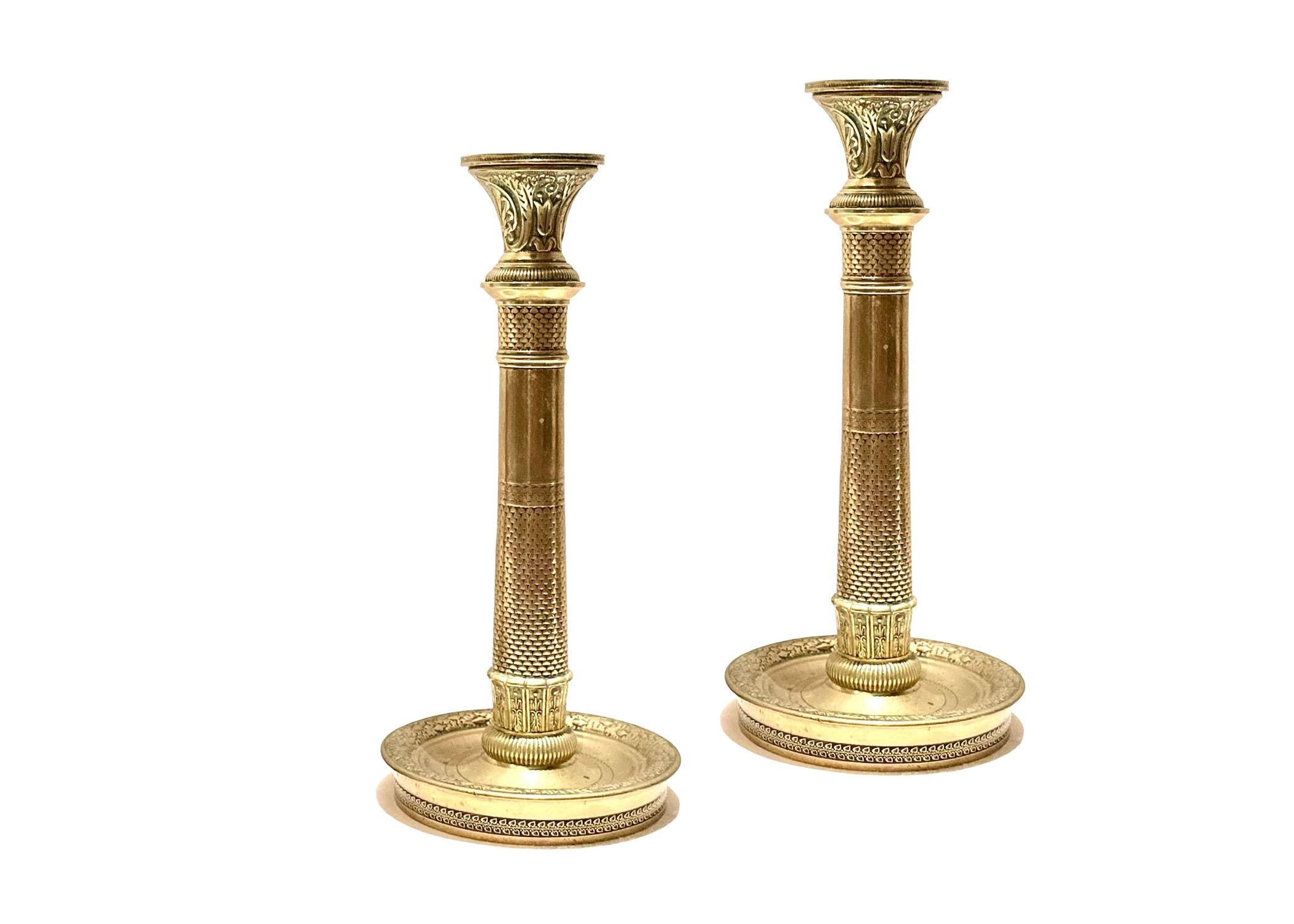 A very unusual and attractive pair of tapered French bronze candle holders. circa 1800s.