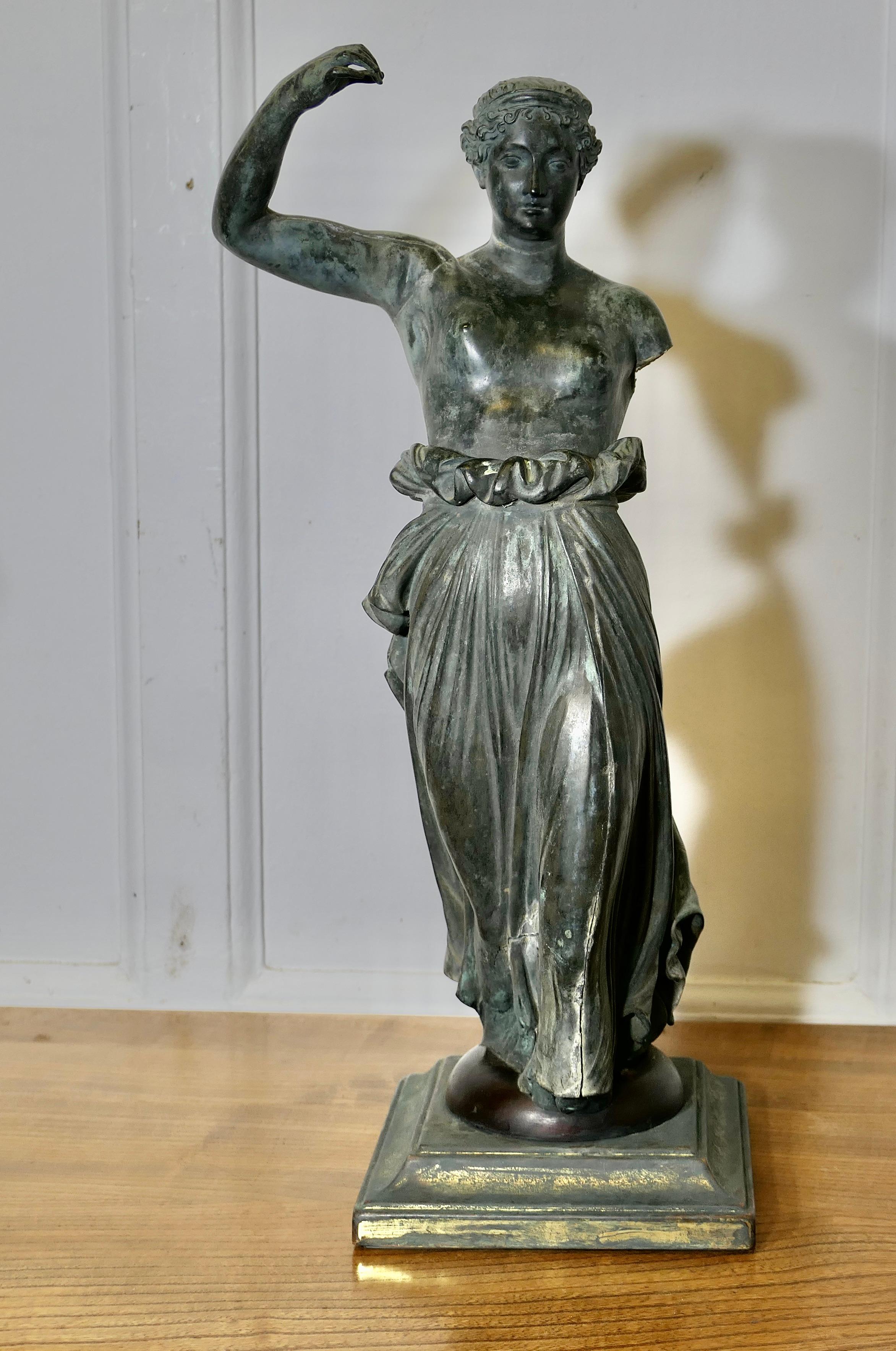 Neo Classical Bronze Statue of Hebe The Greek Goddess of Youth

A handsome piece made in bronze and is set on a square plinth, the statue  is fully 3 dimensional and looks very attractive from all sides
Hebe has a superb ancient patina and she has