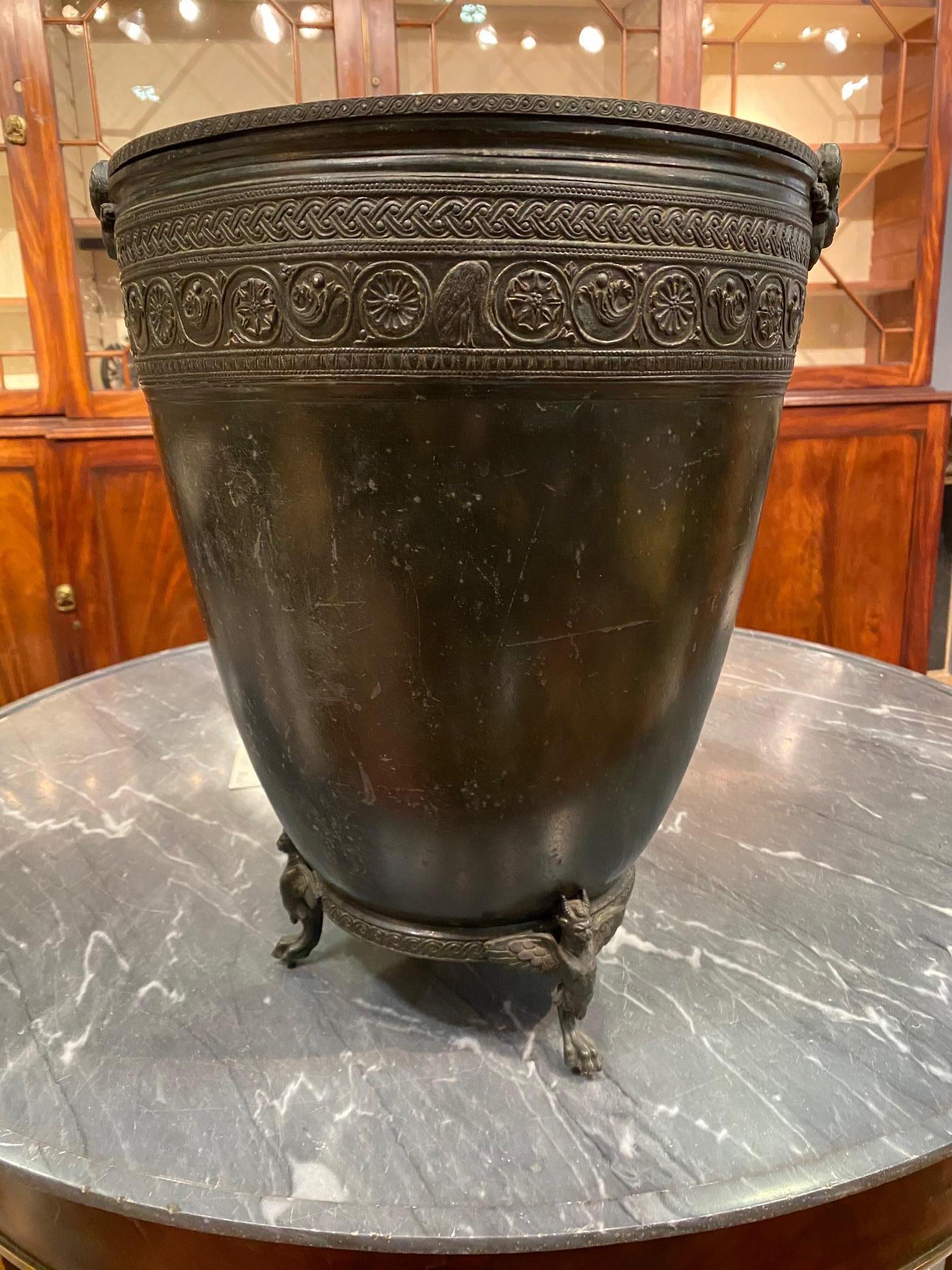 Neoclassical Grand Tour bronze vase by J. Chiurazzi & Fils higlhy decorated with scroll, scene in relief and paw feet with cartouche handles.
