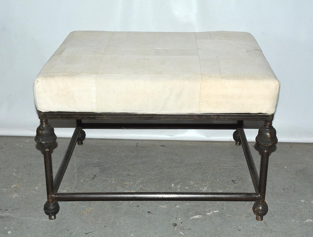 This Neo-classical iron ottoman has great presence. It lends itself to work with many decor and uses. Large enough to be used as an occasional table or coffee table.