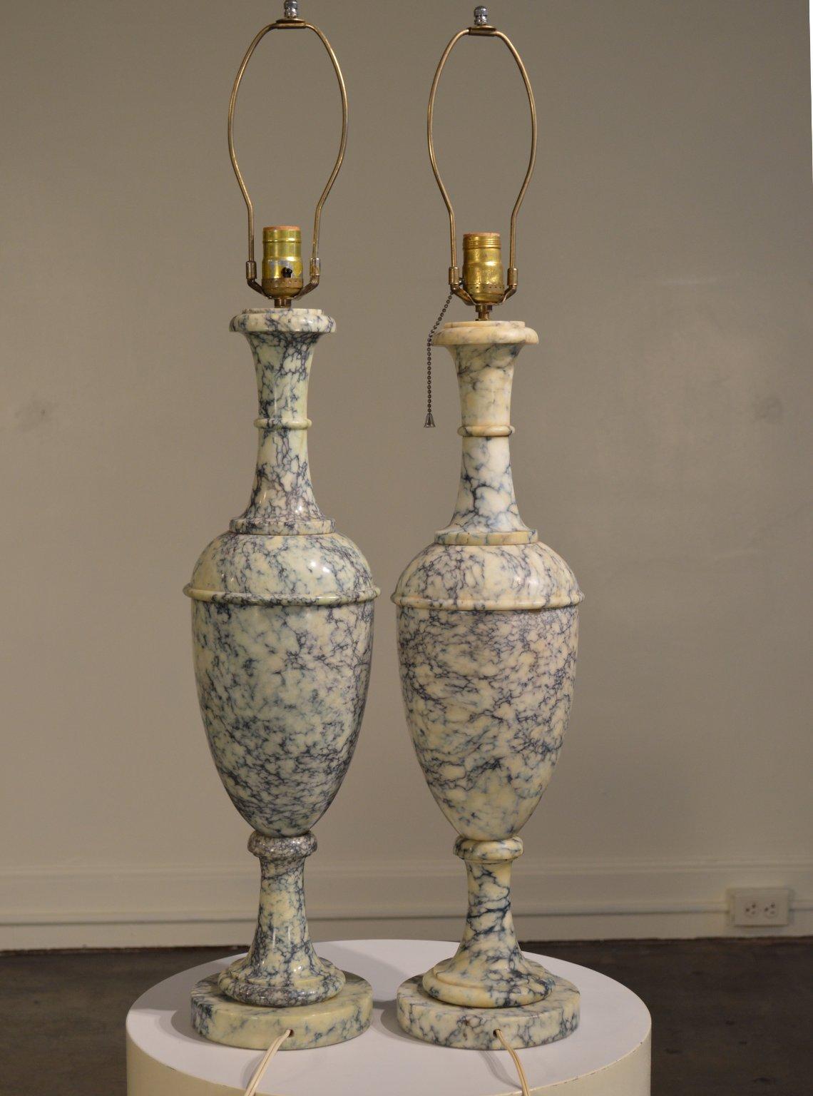 A large pair of Italian marble urn lamps. Very unique and dynamic blue-green veined marble resembling bleu or Roquefort cheese, turned into an elegant interpretation of neoclassical form.