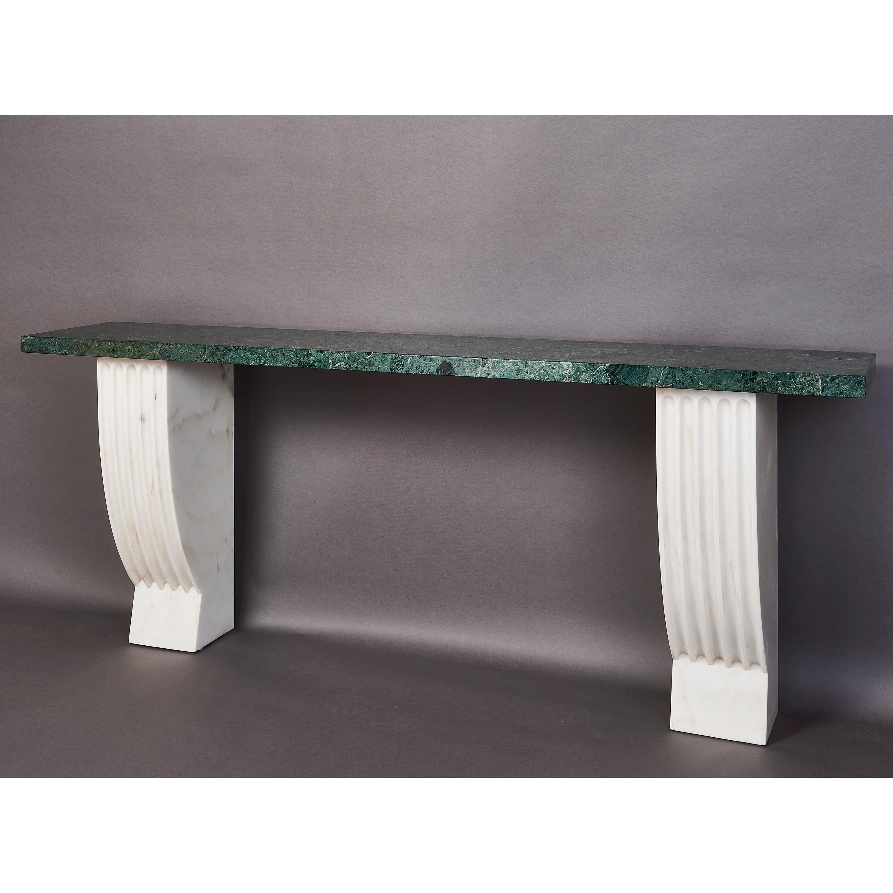 Italy, 1930's
An early Italian marble console
A magnificent example of Italian neoclassicism of the 20's and 30's, in the manner of Piero Portaluppi and Tomaso Buzzi, the Carrara marble deeply fluted, with richly figured Verde Alpi marble