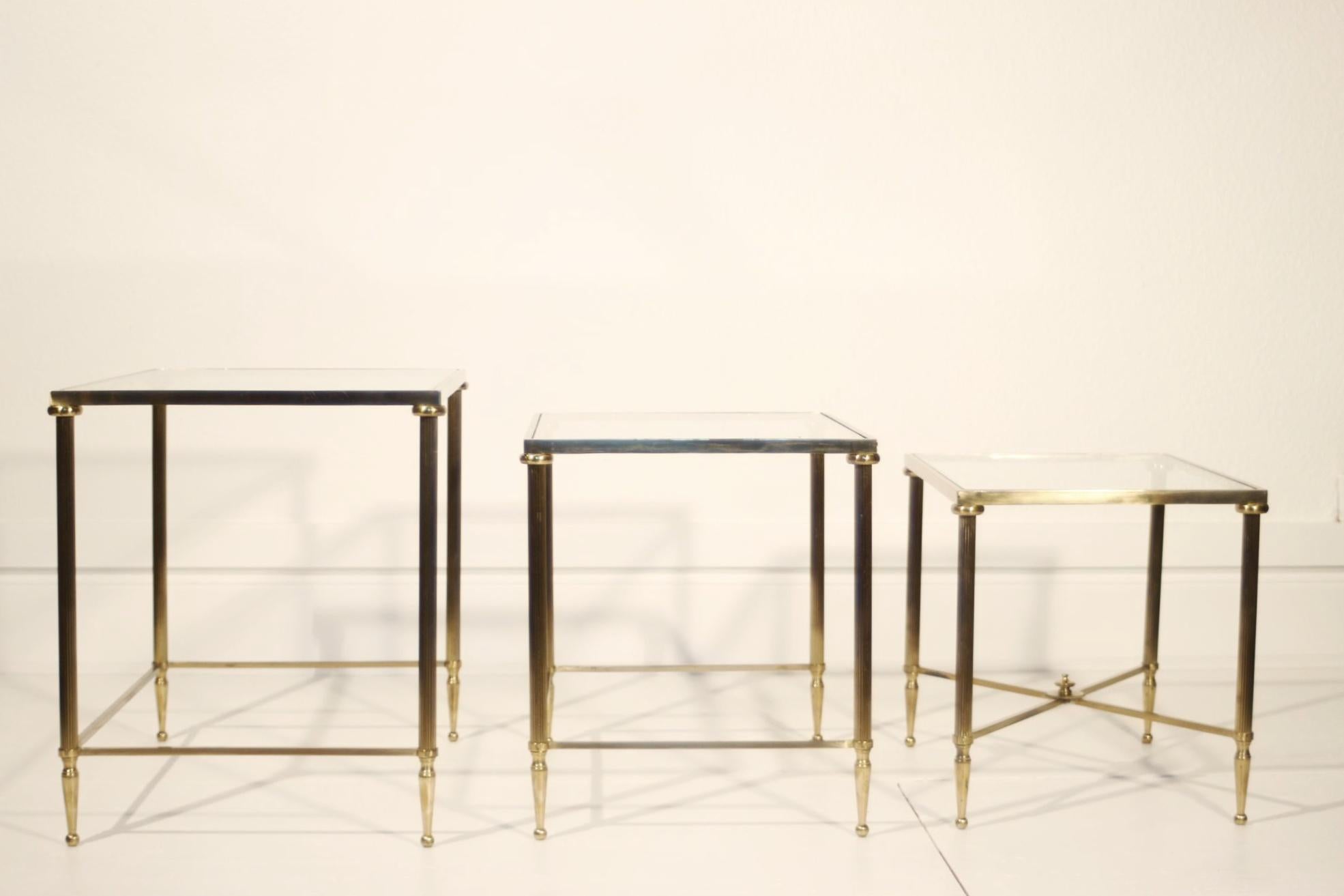 Neo-classical nesting tables in gilded brass & glass by Maison Jansen, France  For Sale 6
