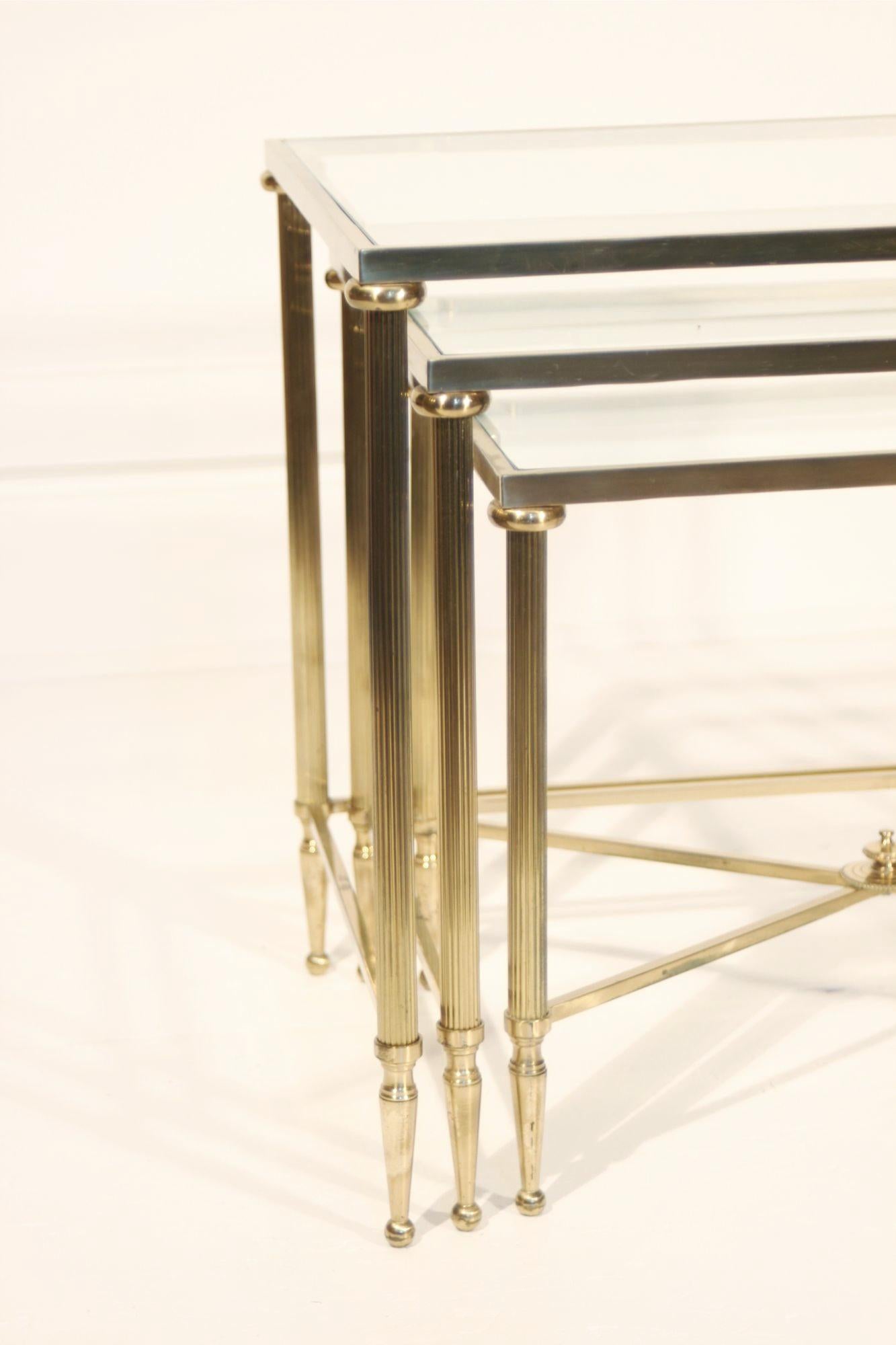 French Neo-classical nesting tables in gilded brass & glass by Maison Jansen, France  For Sale