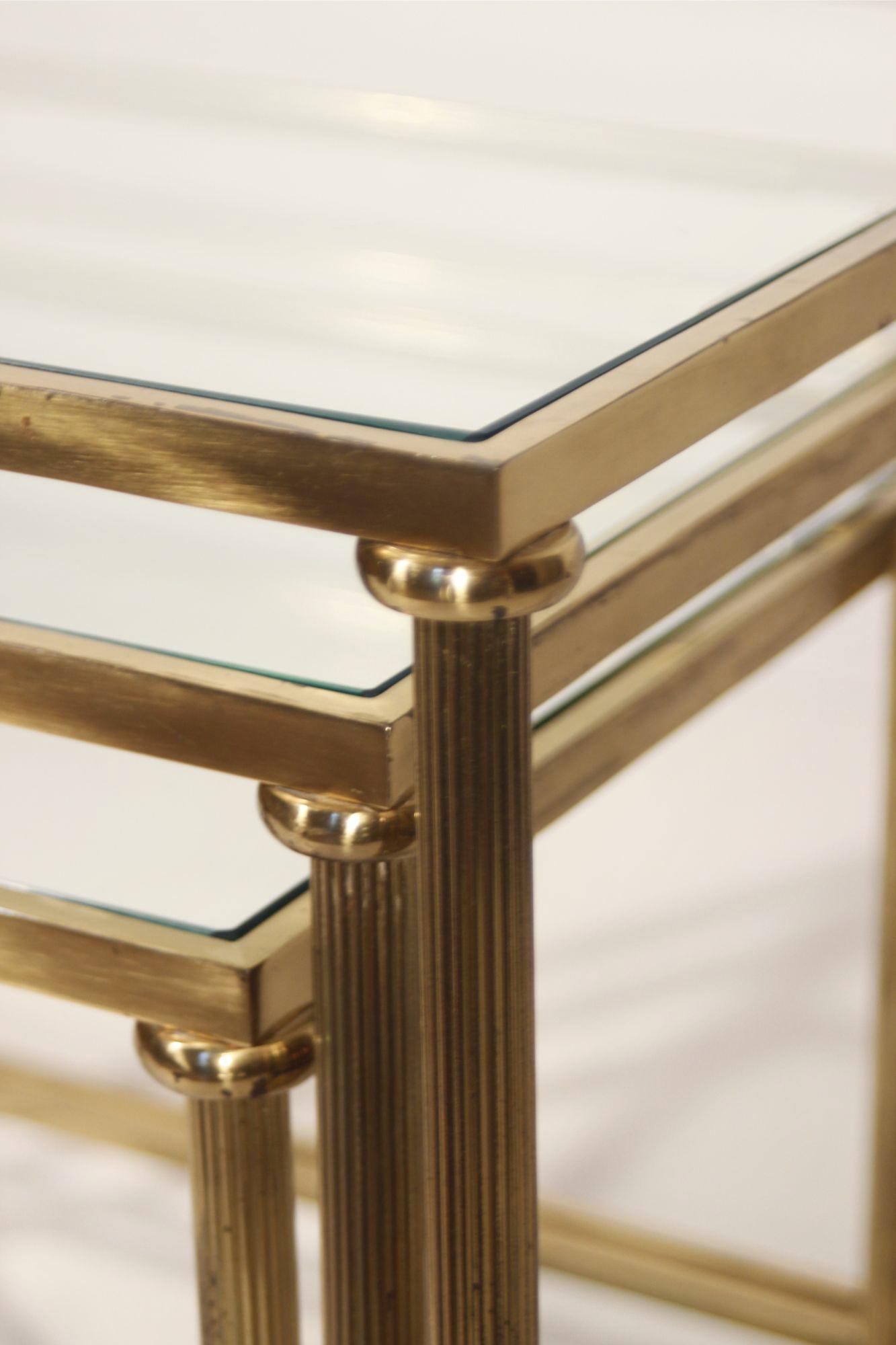 Neo-classical nesting tables in gilded brass & glass by Maison Jansen, France  For Sale 1