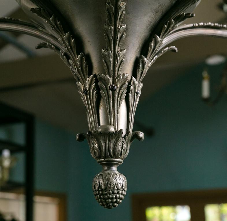This chandelier is a little bit unusual but we find it very unique charming. I do not find many like this. It has been wired in the US and certainly has a nice Classic appeal.