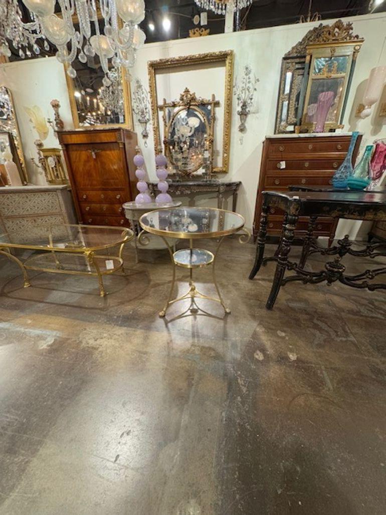 The Neo-Classical Style Bronze and Marble Gueridon Table is a luxurious piece of furniture that exudes elegance and sophistication. Perfect for adding a touch of old-world charm to a room, this  table is sure to be a focal point in any home