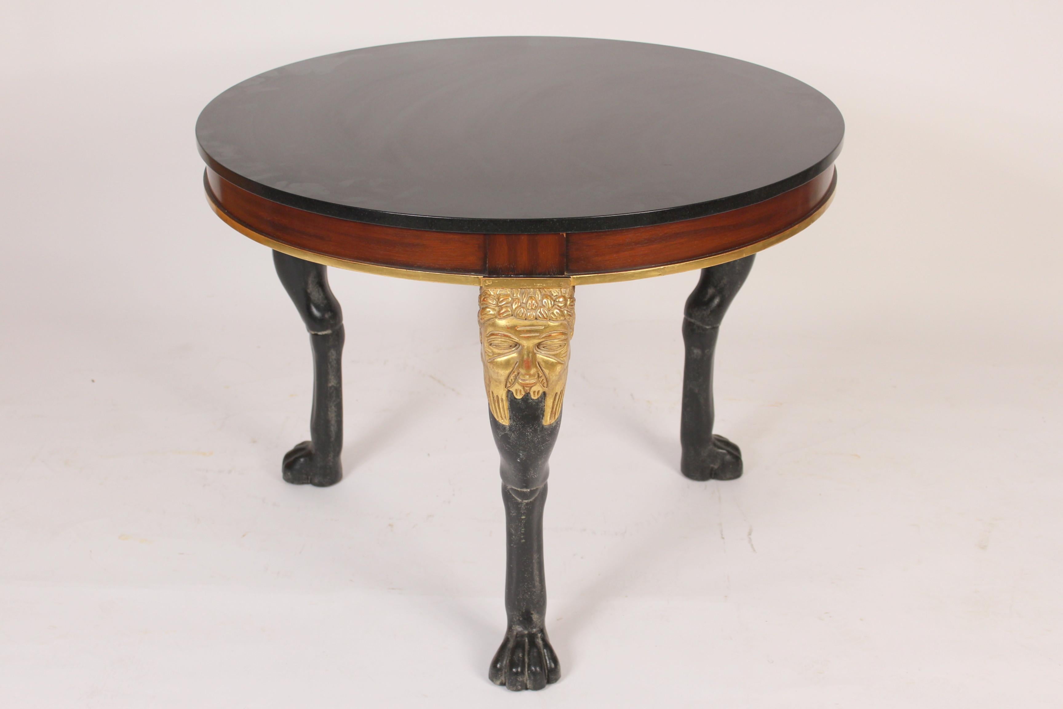 Neoclassical style mahogany, gold leaf and painted center / occasional table with a marble top, circa late 20th century. Inscription on bottom of table indicates an association with Quatrain in Los Angeles, either made by or used on a design project.