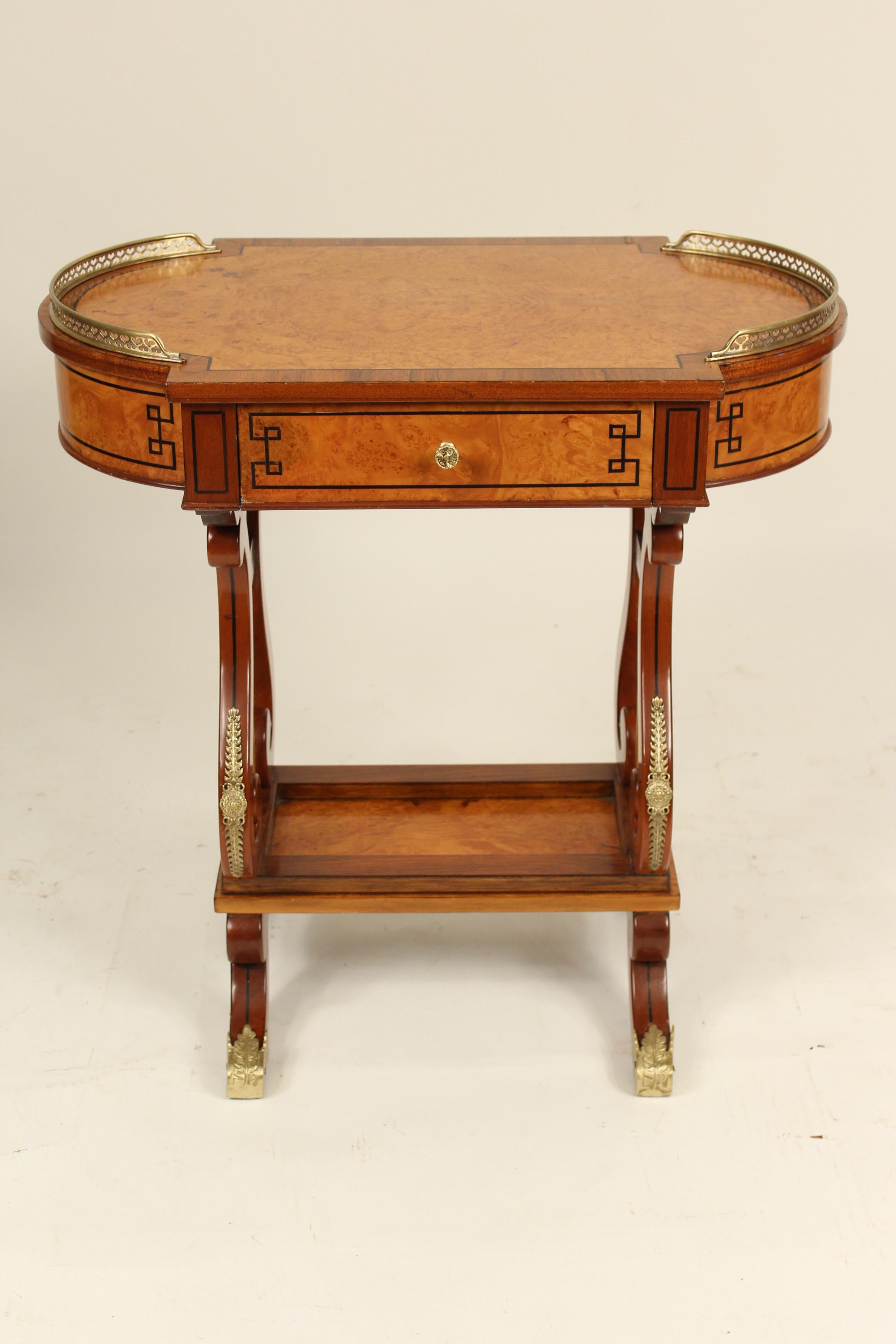 Neoclassical style burl ash and tulip wood single drawer occasional table with brass mounts, circa 1970s. Measure: Surface height 28