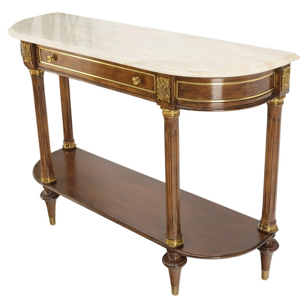 Neo classical walnut brass marble top demi lune shape drawer console sofa table.
Turned legs tow tear console.