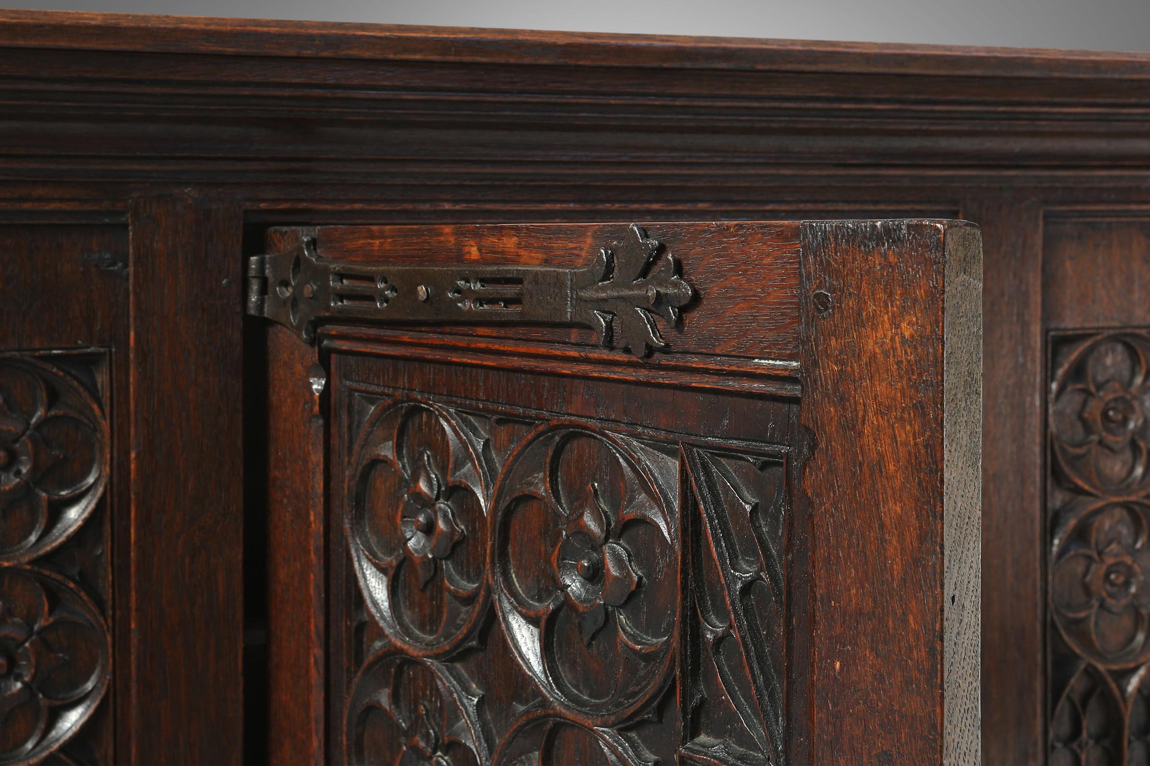 Neo-gothic cabinet in oak with rich decorations and hidden storage, France, 1850 For Sale 2