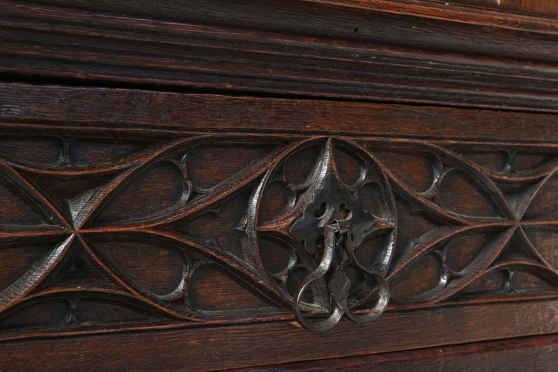 Neo-gothic cabinet in oak with rich decorations and hidden storage, France, 1850 For Sale 3