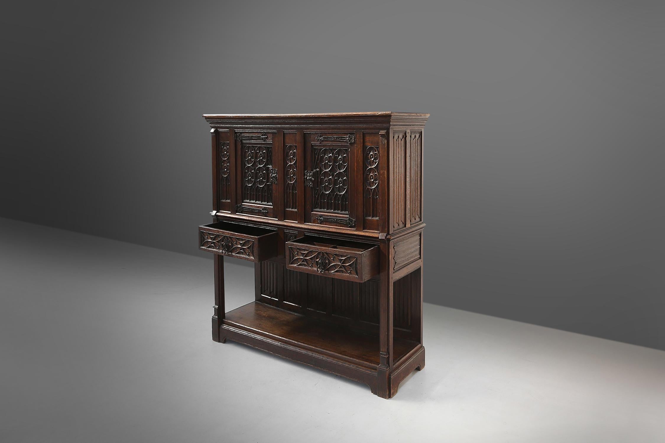 Neo-gothic cabinet in oak with rich decorations and hidden storage, France, 1850 For Sale 4