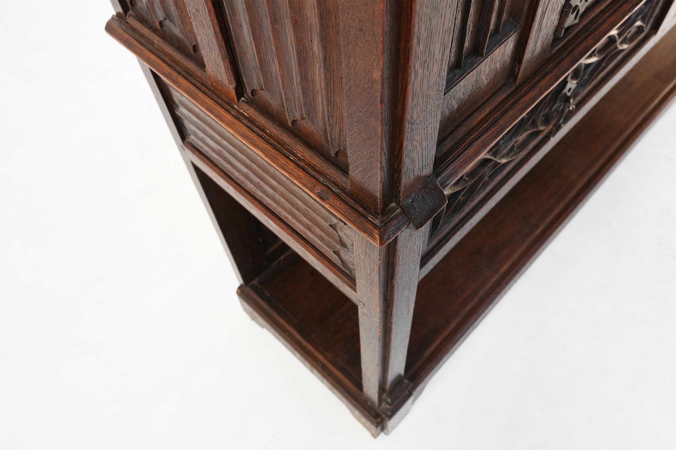 Neo-gothic cabinet in oak with rich decorations and hidden storage, France, 1850 For Sale 7