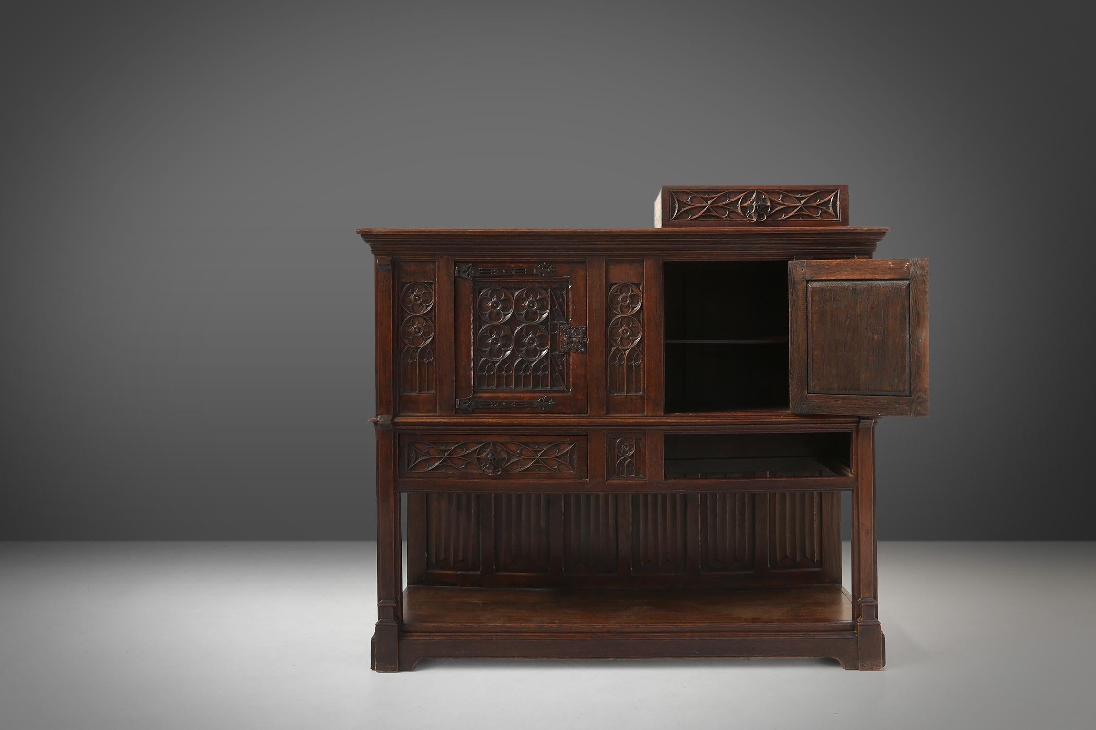 Neo-gothic cabinet in oak with rich decorations and hidden storage, France, 1850 For Sale 10