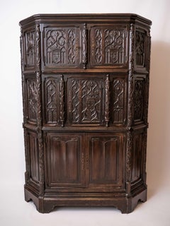 Neo-Gothic oak cabinet. Richly carved