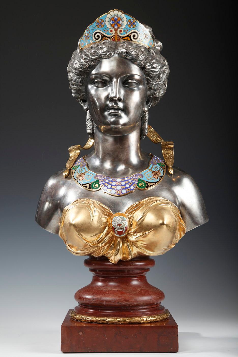 Signed Machauld et Eug. Cornu – G. Viot et Cie Fondeurs

Bust of a Greek goddess, made entirely of silvered bronze and gilded bronze. The tiara and collar necklace ornating the bust are finely decorated with stylized floral motifs of polychrome