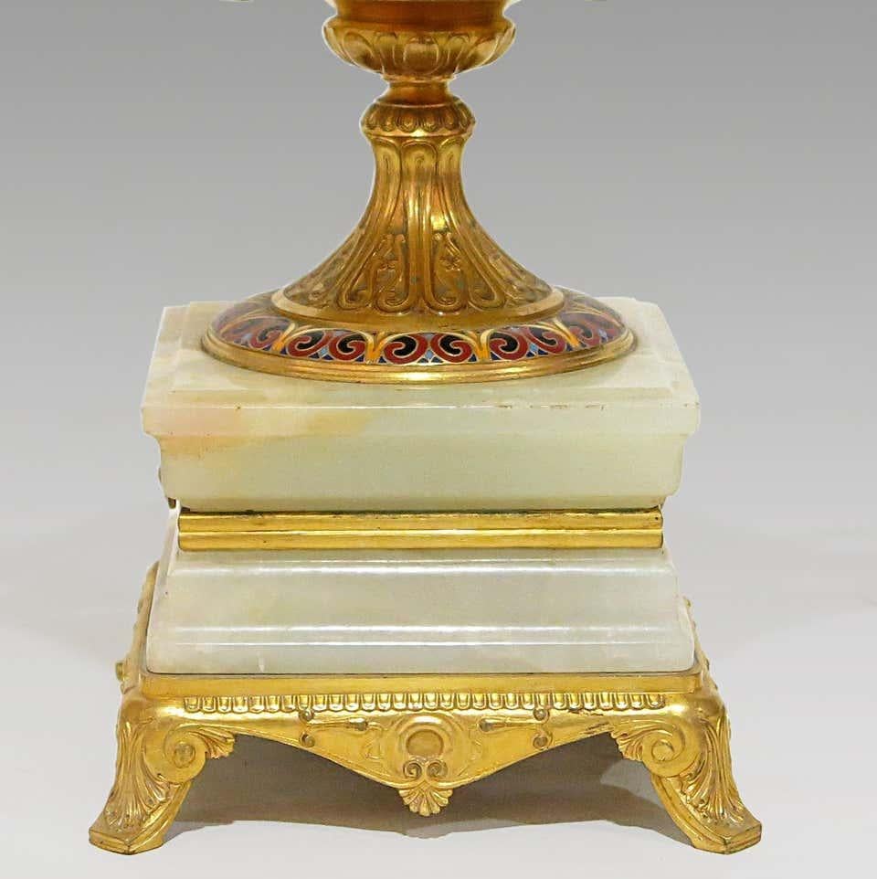 Algerian onyx-marble Etruscan cup, gilt bronze with champlevé enamels decorations in the style of Byzantine arabesques drawn in the Greek and Roman manuscripts. Piedouche cup laid on a square base. Decorated with ancient motive, chased gilt bronze,