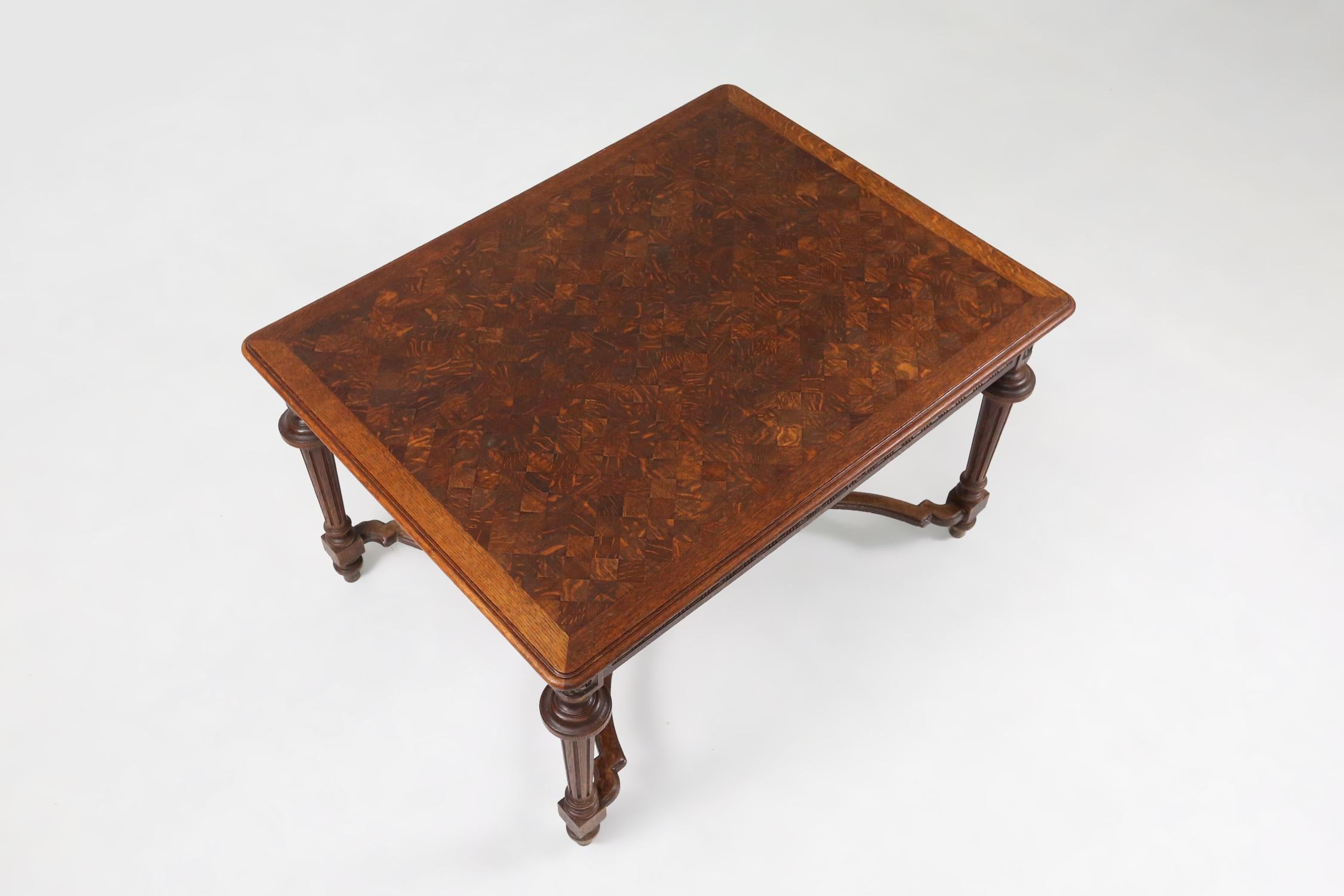 France / 1900 / Neo Renaissance / extendable dining table / hand carved wood and chess board top   

This exquisite table is a hard to find piece of neo-renaissance design, originating from France, 1900. The intricate carving on both the top and
