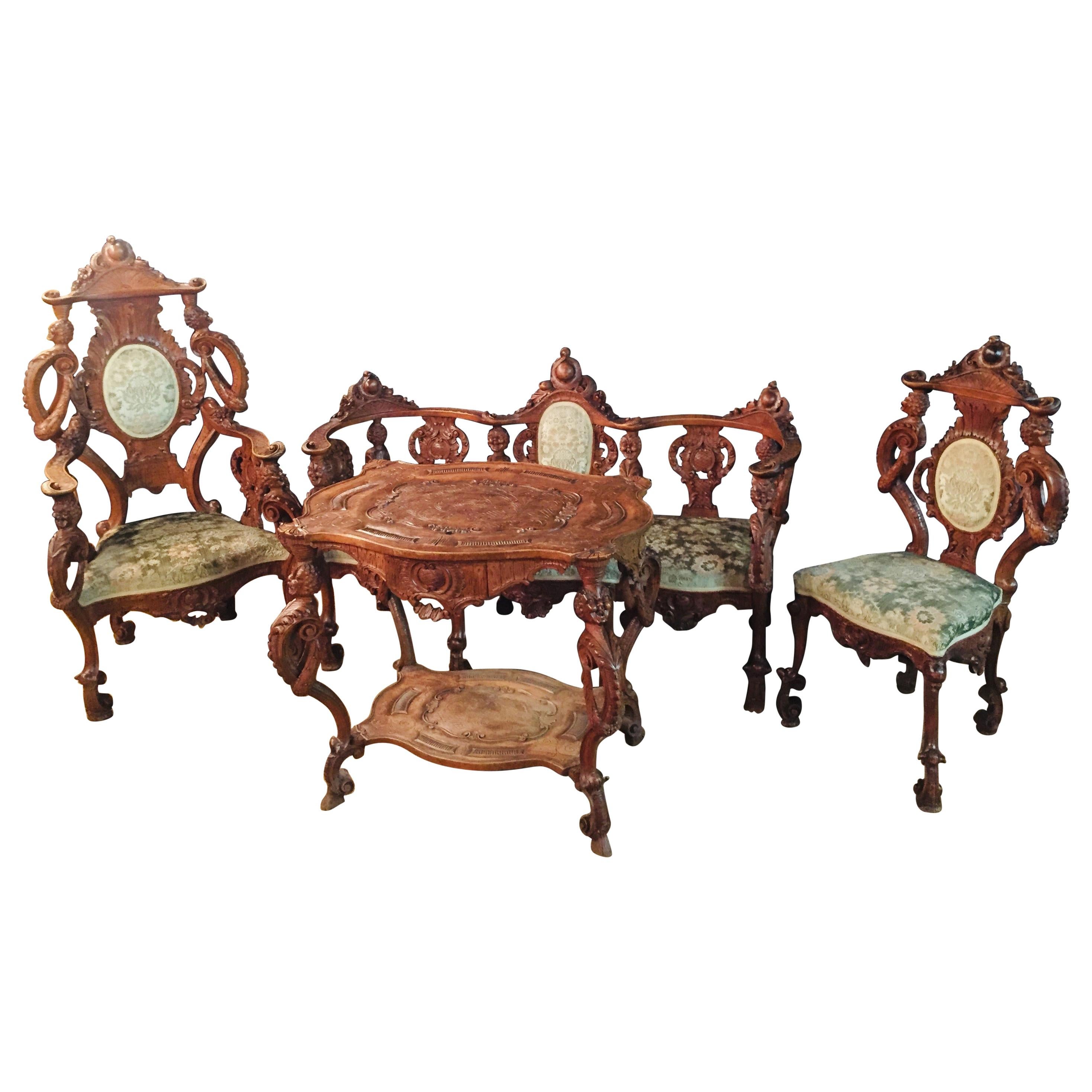 Neo Renaissance Full Carved Set of Sofa, Armchair, Chair and Table, circa 1860