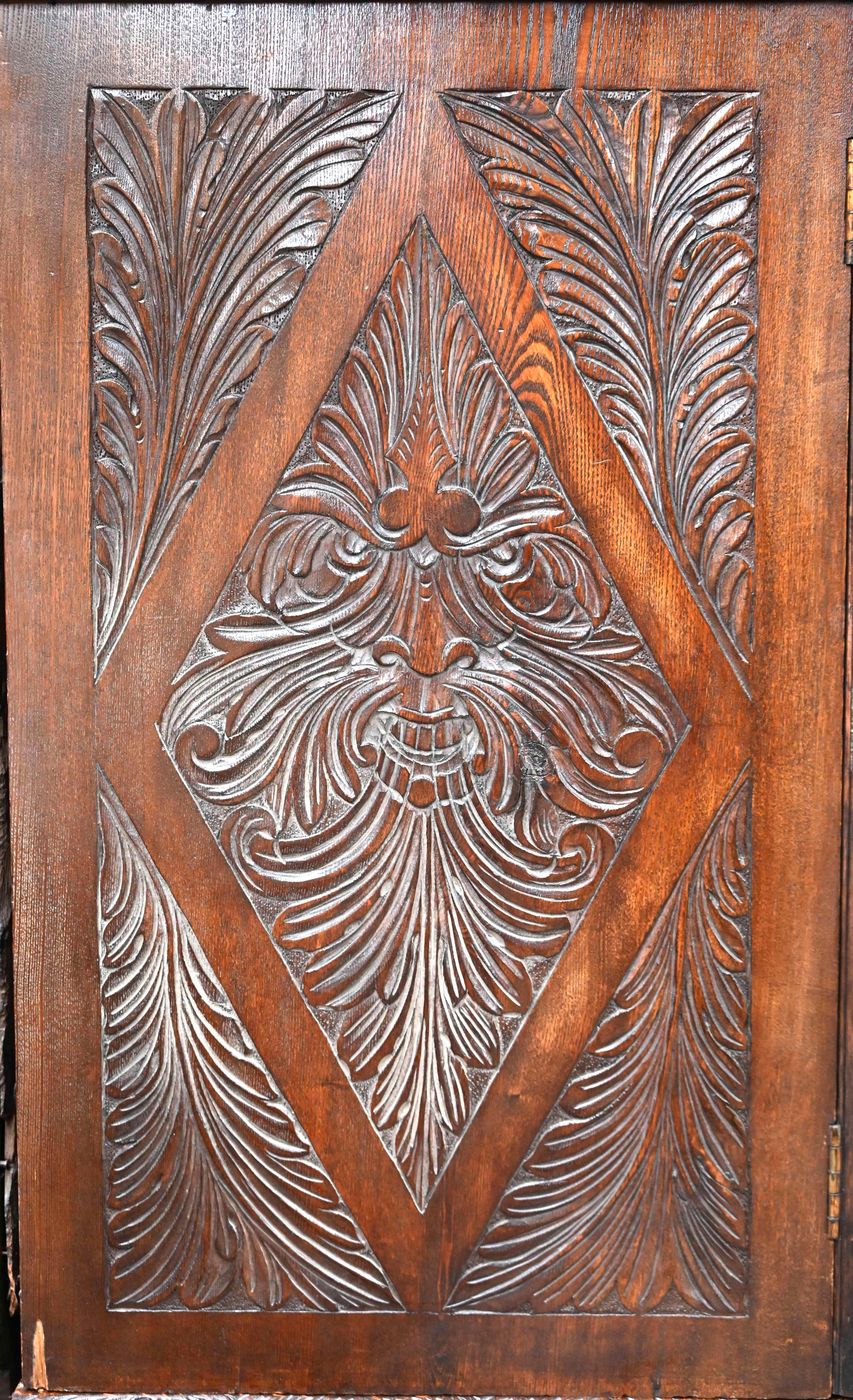 Hand-Carved Neo-Renaissance oak cabinet with lion heads For Sale