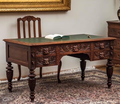 Neo-Renaissance oak writing desk with mascarons