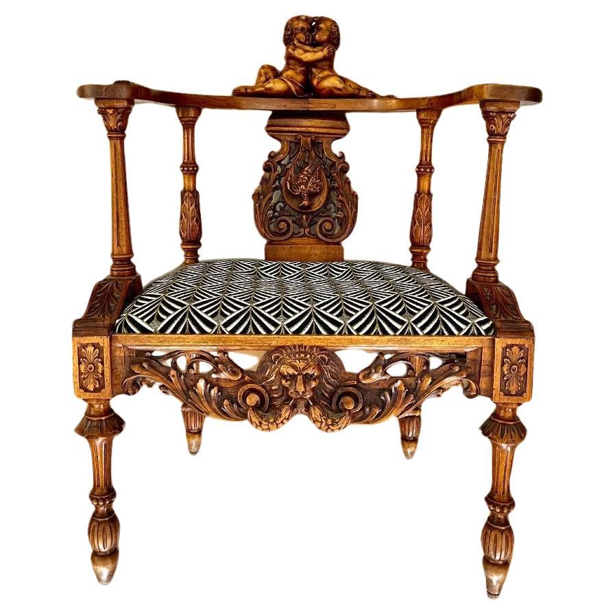 Neo-Renaissance putti armchair in sculpted wood, Louis XIII style, 19th century For Sale
