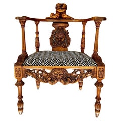 Neo-Renaissance putti armchair in sculpted wood, Louis XIII style, 19th century