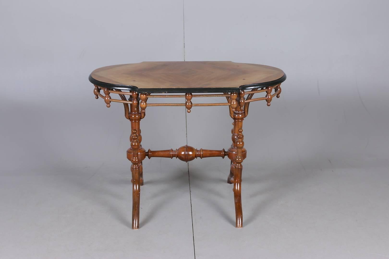 Playful walnut construction with turned and curved parts, made in Germany, circa 1870s.