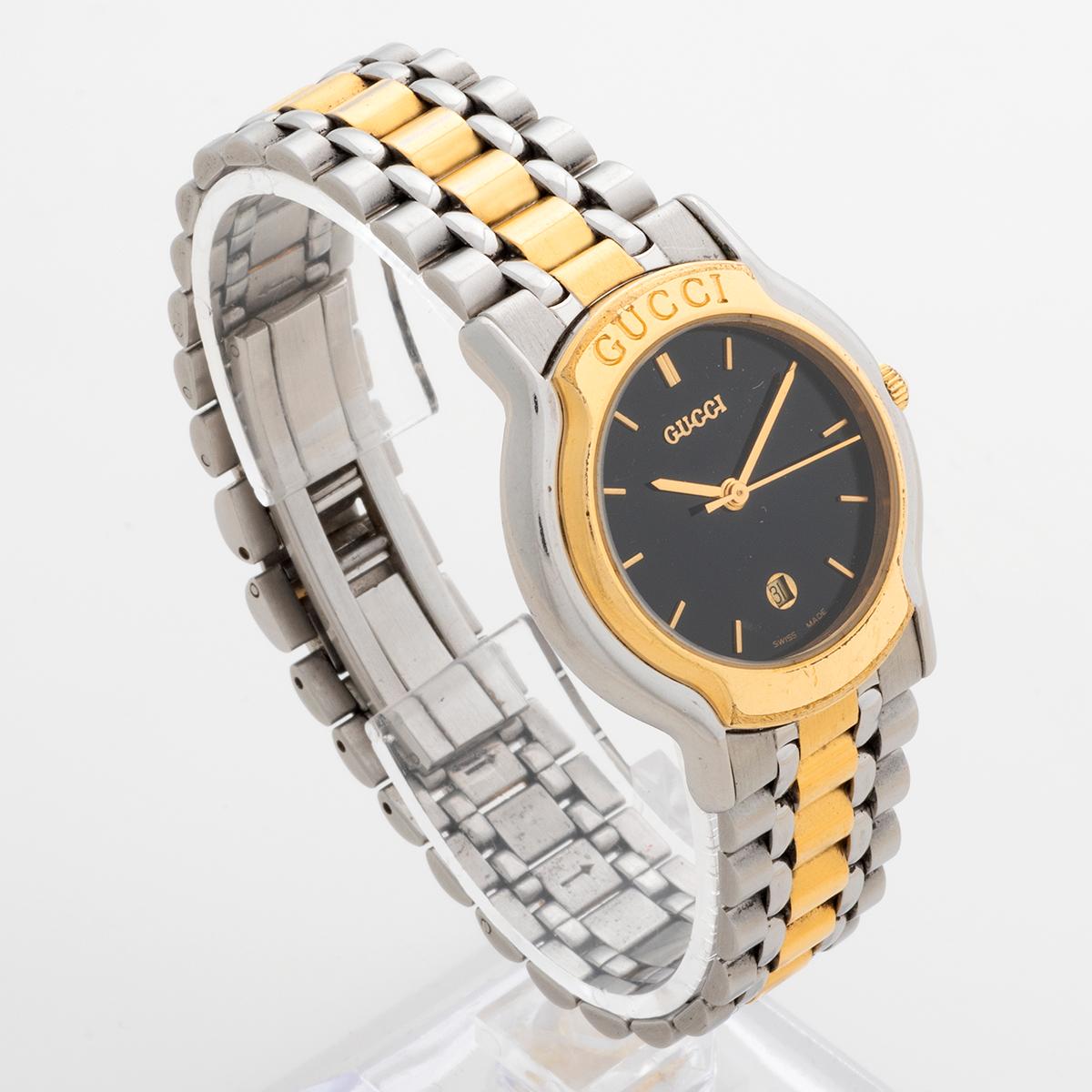 Our neo vintage Gucci 8000L features a stainless steel and gold plated case (28 x 34mm) and bracelet with black dial. A larger than average ladies watch when new, this is a relatively unusual reference. An ideal retro watch for any occasion we date