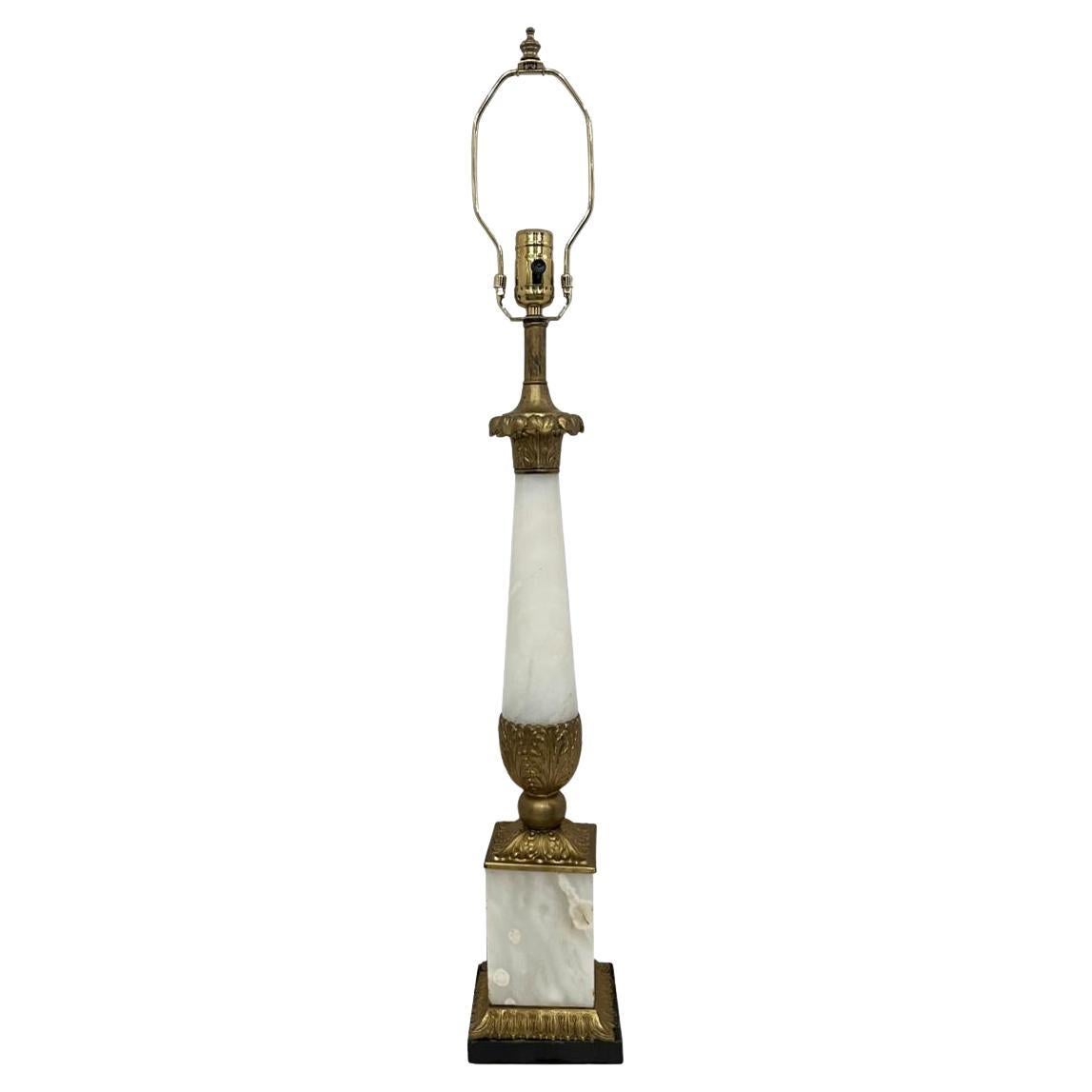 Pair of circa 1920's French Italian alabaster and bronze table lamps with gilt bronze details.

Measurements:
Height of body: 24