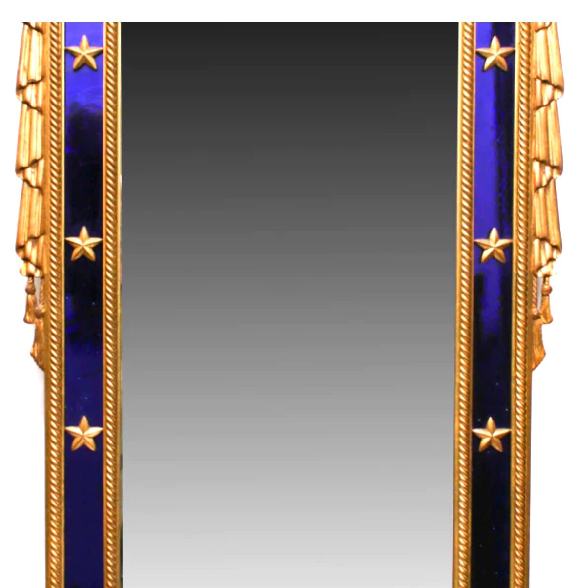 Luxurious graciously fit for an Emperor!
Stunning unique Neoclassic style giltwood Mirror with gorgeous cobalt blue mirror trim surrounded with raised gilt stars and raised carved flowers by Carvers Guild.
Beautiful wood carvings by a masterful