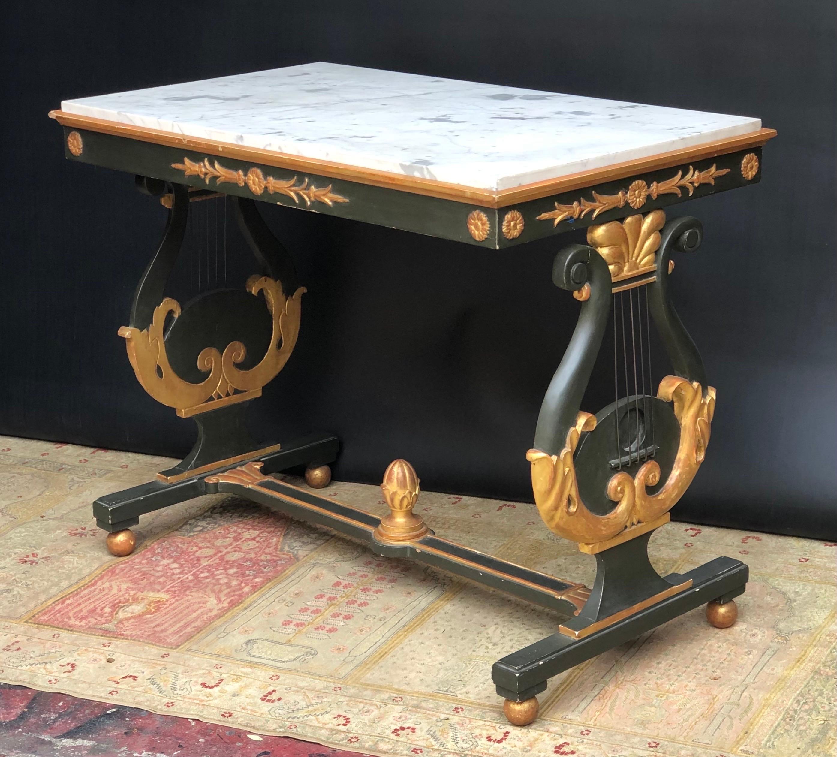 A Sophisticated Neo-Classic Parcel-gilt and Verde Painted Italian Lyre base marble top table / console made in the 19th Century. This Classical Italian Lyre Base Marble Top Table / Console has an exquisite gray veined Carrara Marble Top inset into a