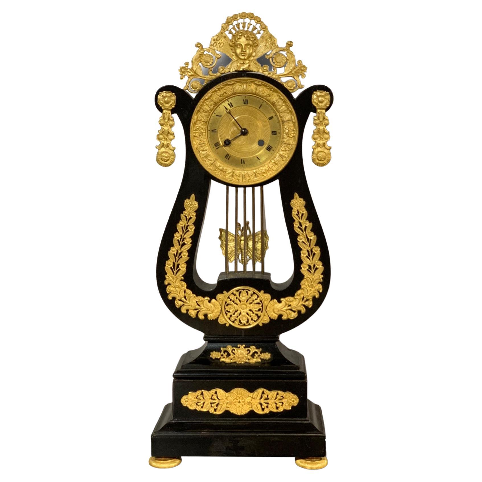 Neoclassic Parisian Pendulum Clock in Bronze and Ebonized Wood For Sale