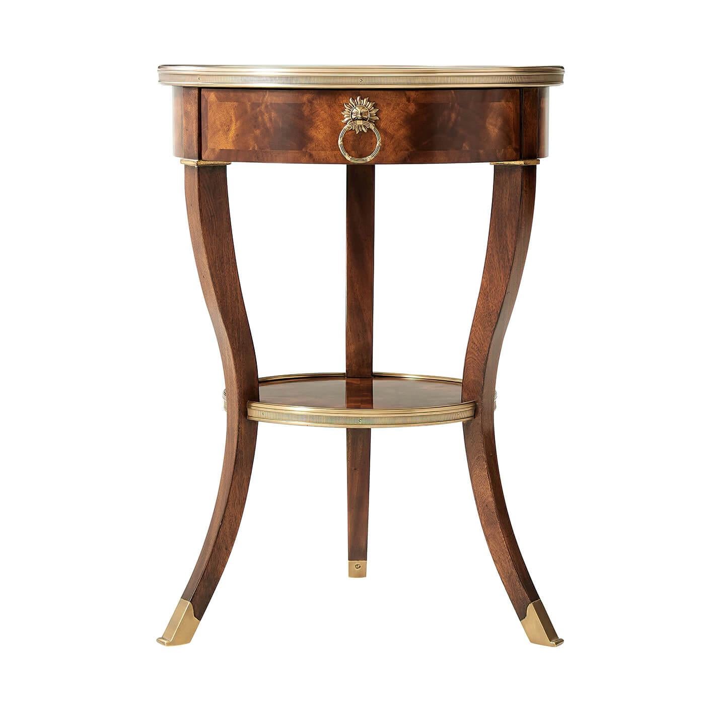 A mahogany neoclassic round end table with one frieze drawer, inswept splay legs, under tier. 

Dimensions: 20