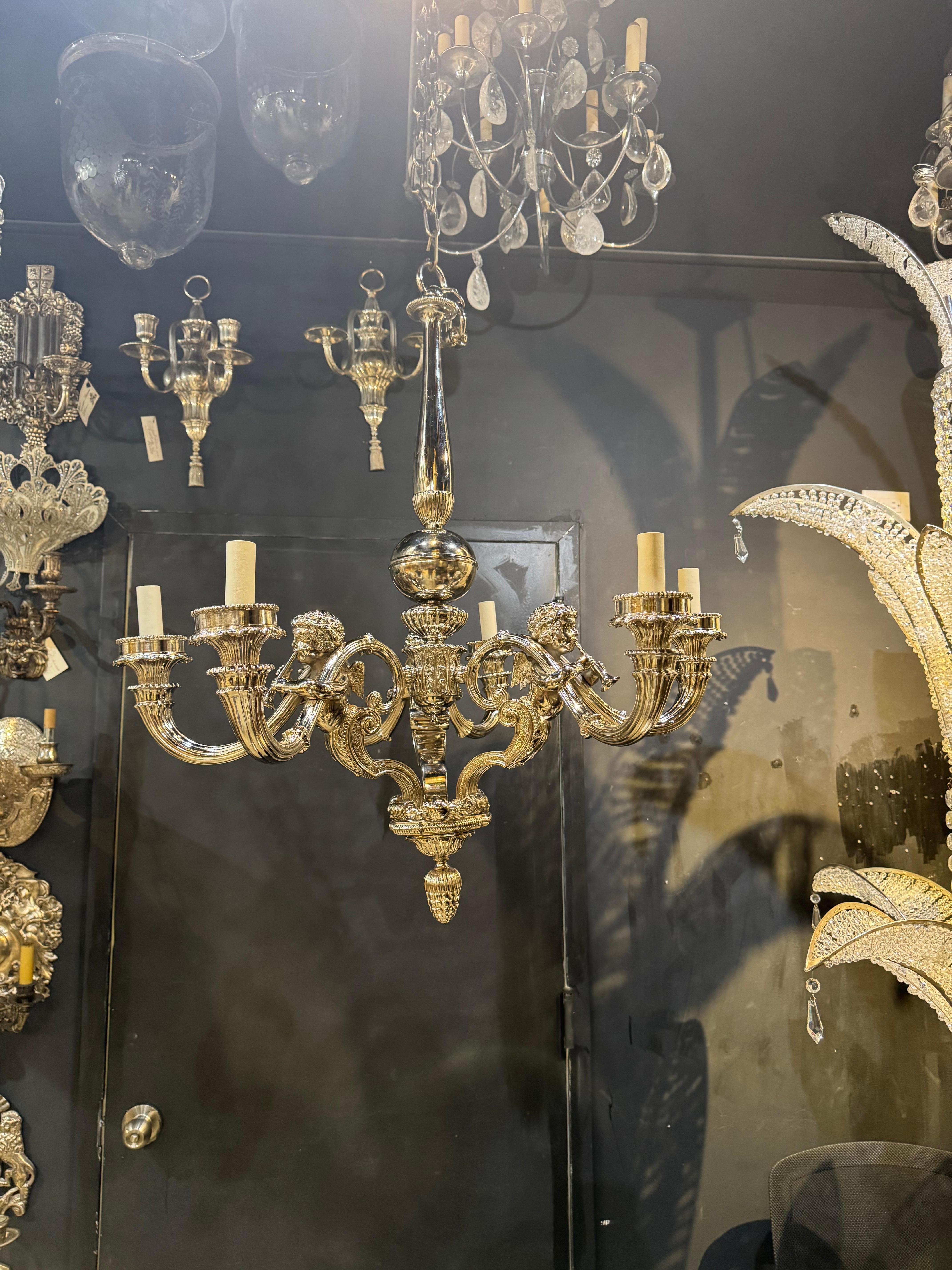Silvered Neoclassic style chandelier with Cherubs For Sale