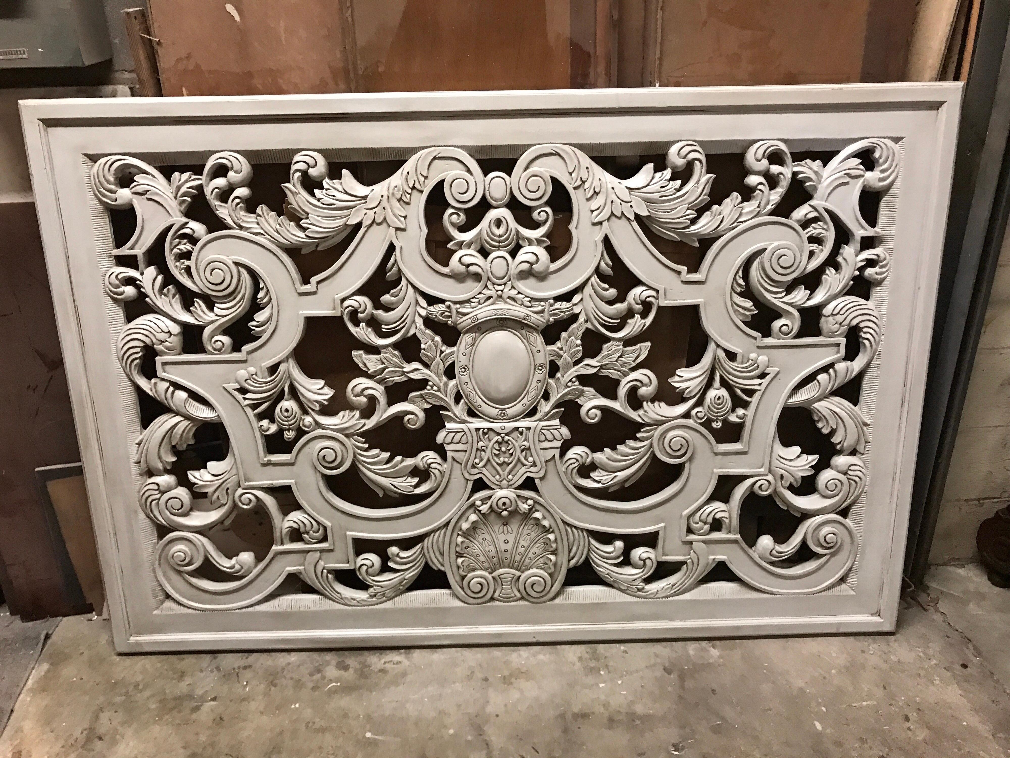 Neoclassic Swedish gray painted carved wood architectural panel, beautifully carved with a center medallion and shell. Weighs about 75 pounds.
