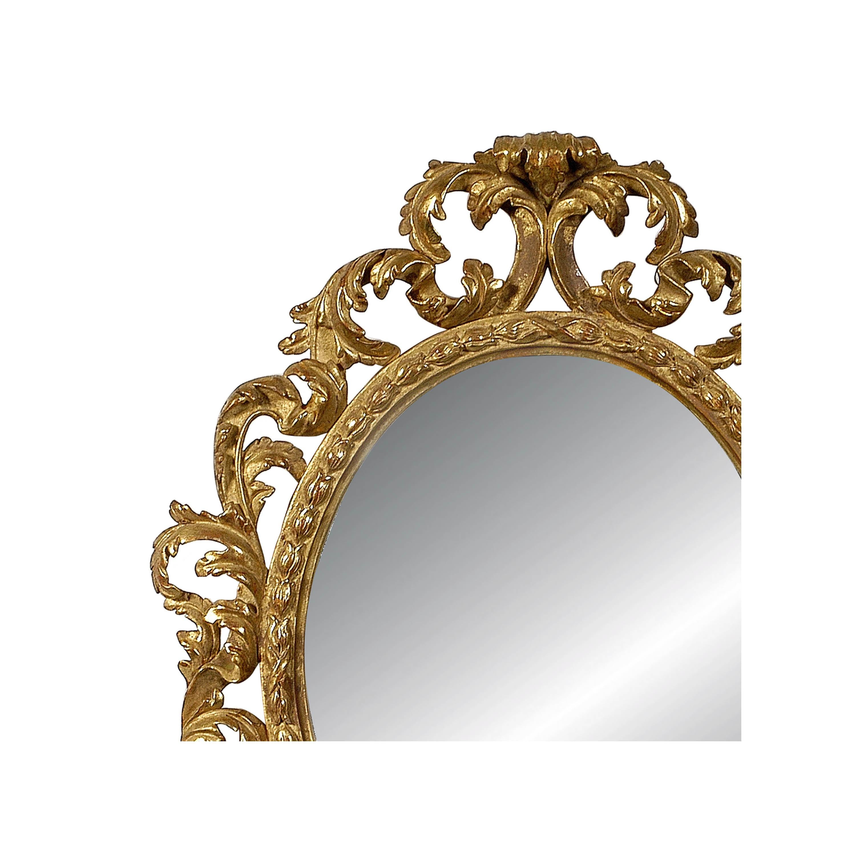 Neoclassical Baroque style handcrafted mirror. Hand carved wooden structure with gold foil finished, Spain, 1970.
