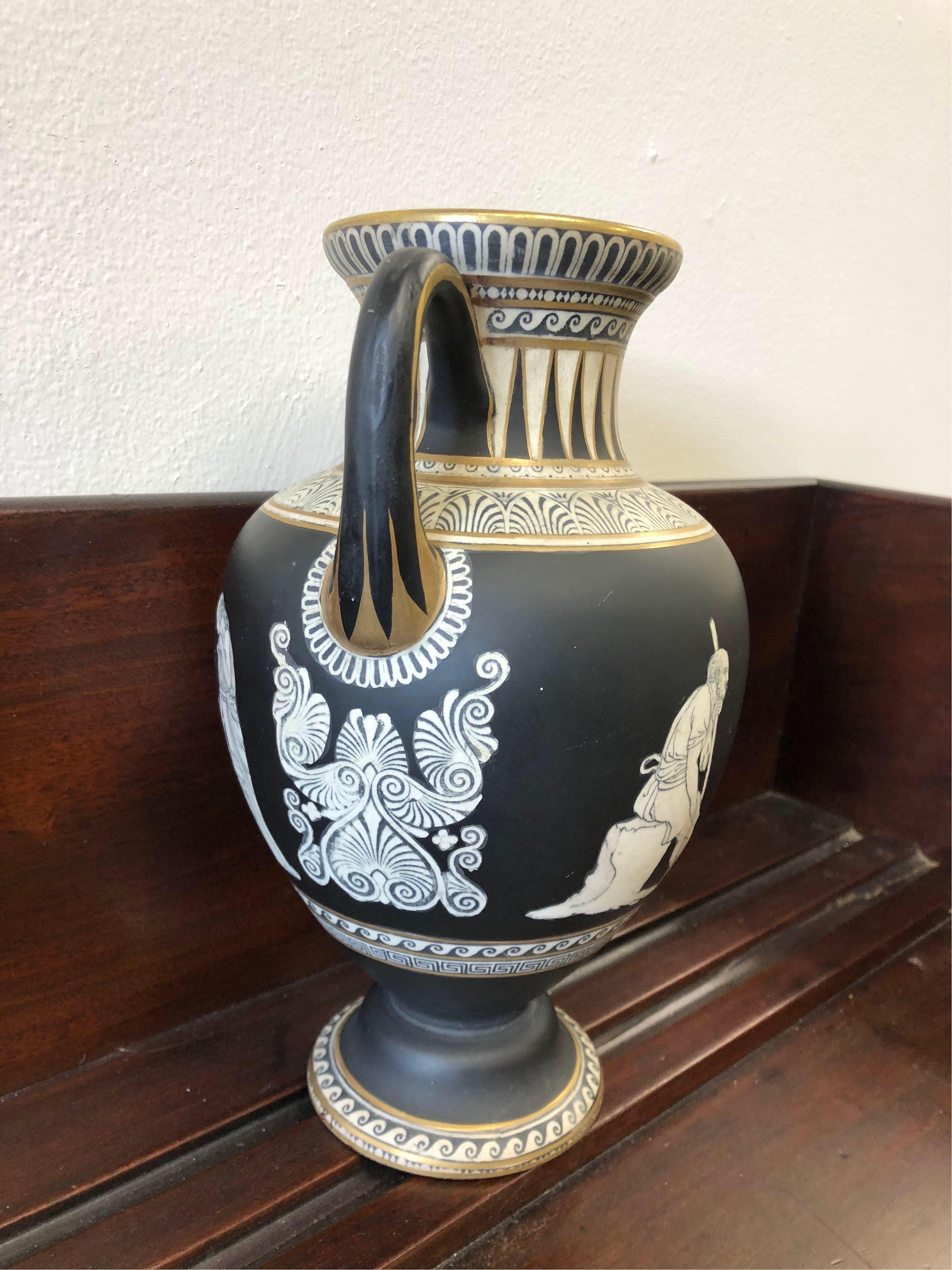 Neoclassical style Prattware black and white pottery vase decorated with classical figures.