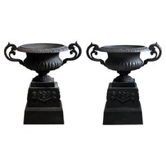 Used Neoclassical Black Cast Iron Urns with Base / Plinth (Set of 2)