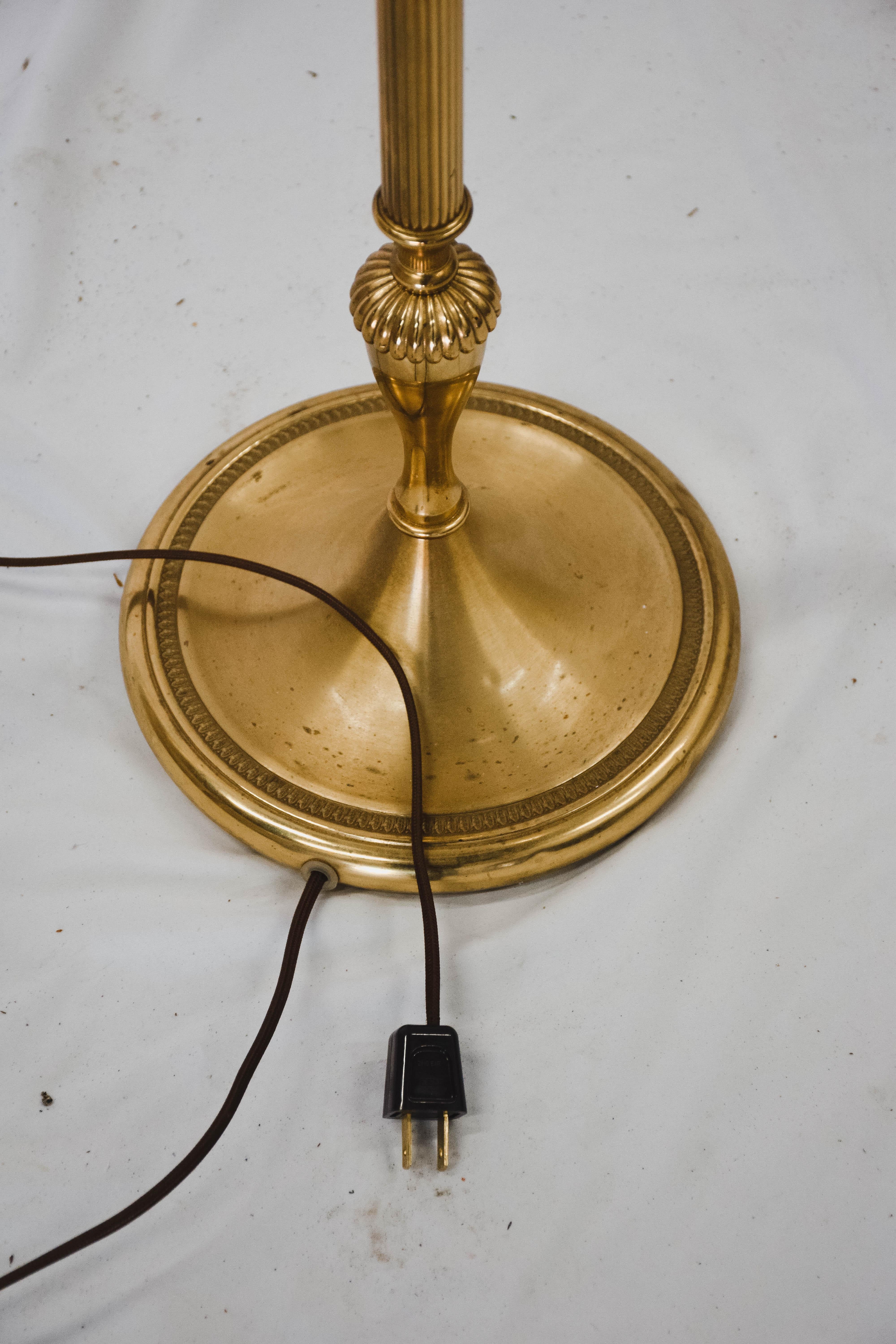 This pineapple floor lamp is made of brass and gilt metal with a black shade, gilt inside. This is a very decorative floor lamp, in the style of famous French designer and maker Maison Charles, circa 1960. Original shade.